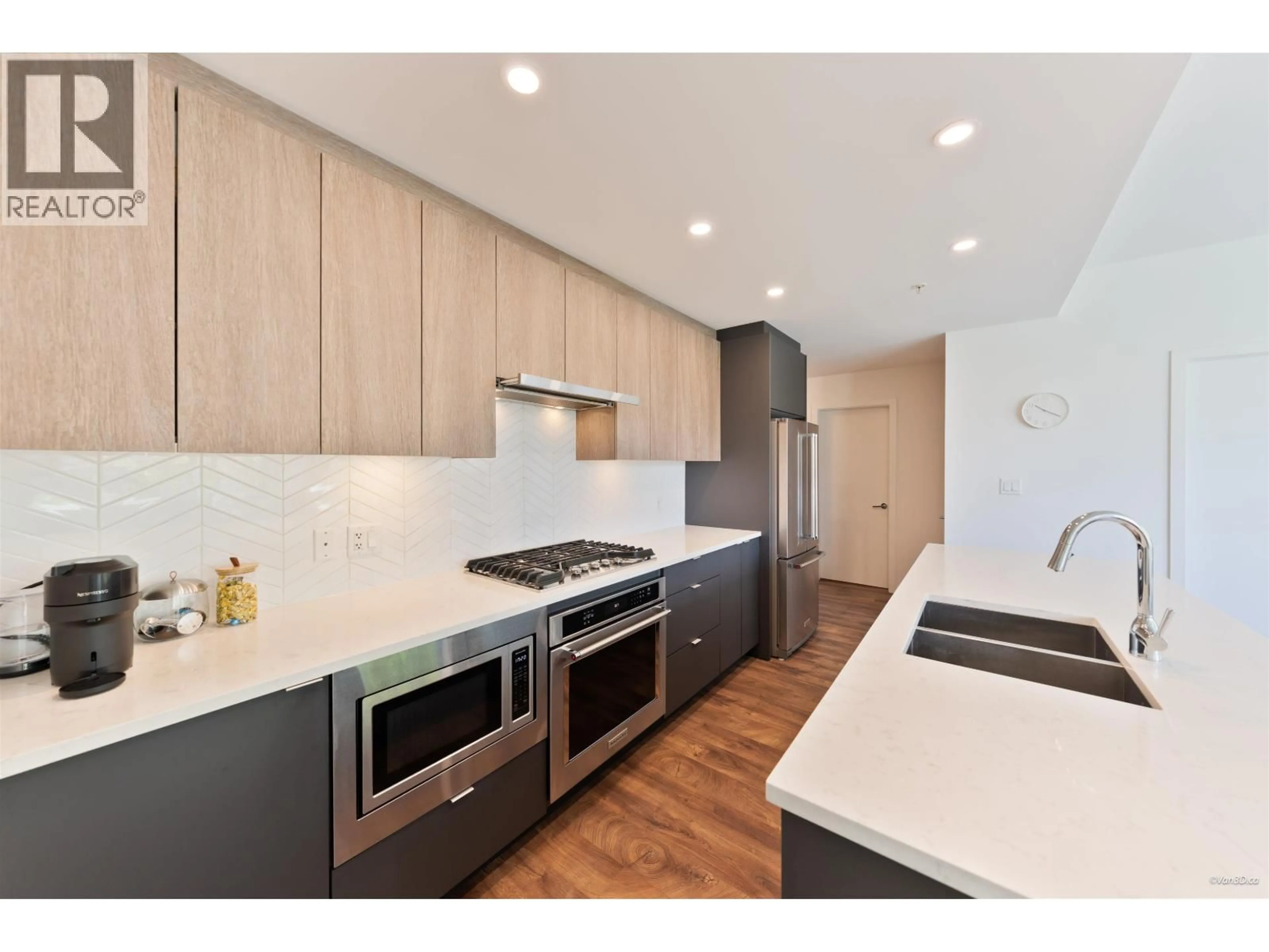 Contemporary kitchen, wood/laminate floor for 208 - 717 BRESLAY STREET, Coquitlam British Columbia V3J0J3