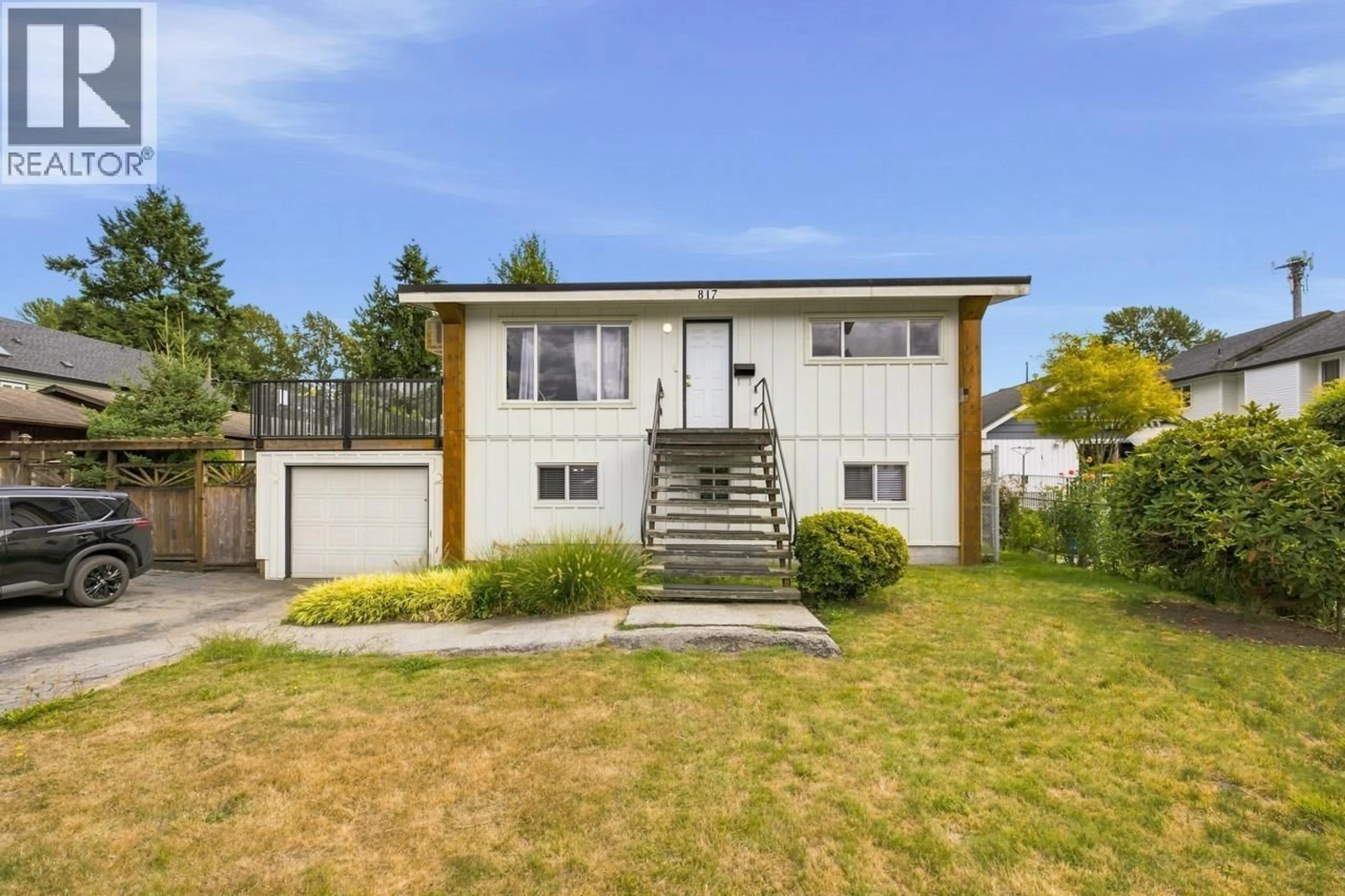 Home with vinyl exterior material, street for 817 GREENE STREET, Coquitlam British Columbia V3C2B9