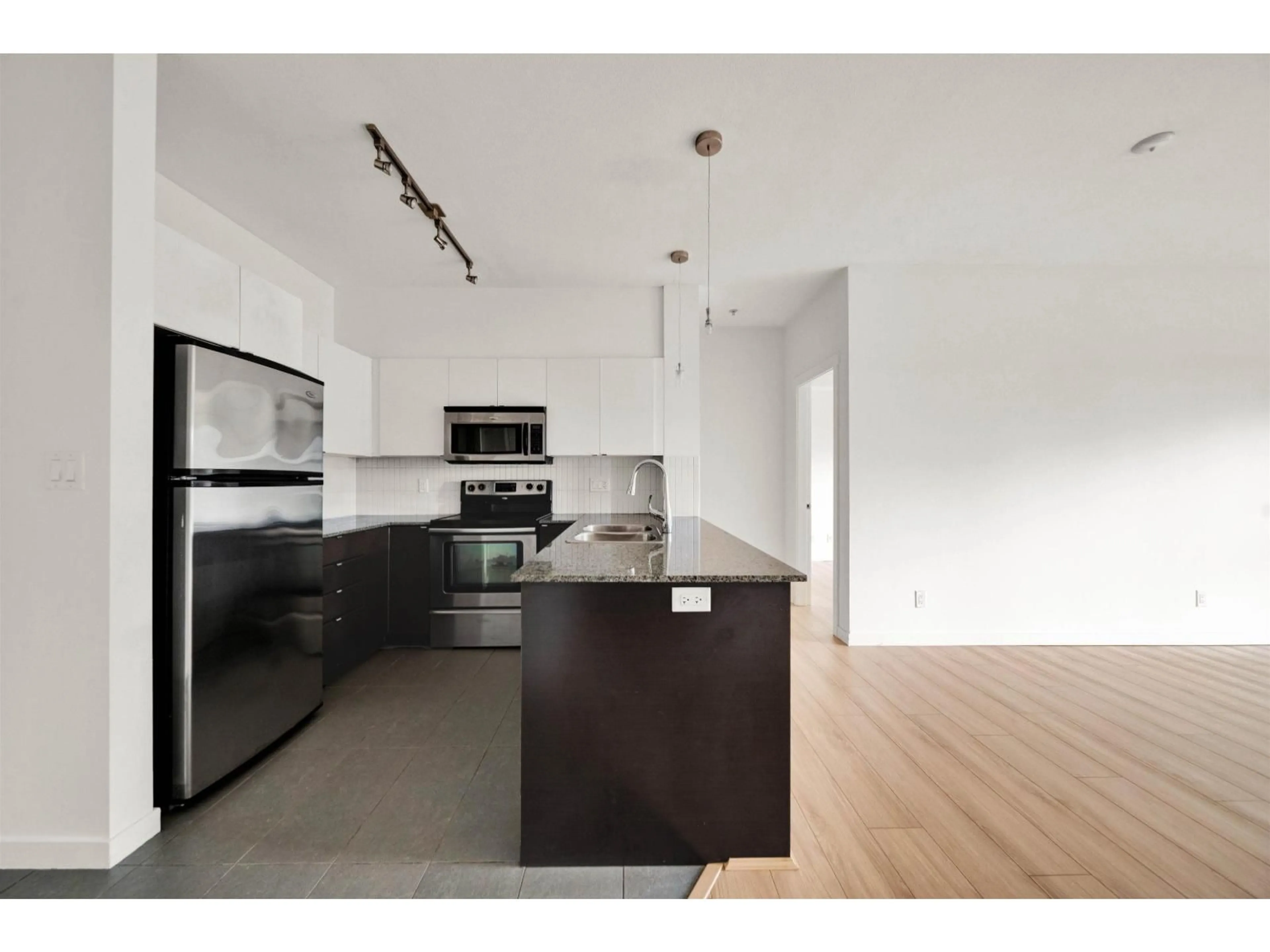 Open concept kitchen, unknown for 437 - 13733 107A AVENUE, Surrey British Columbia V3T0B7