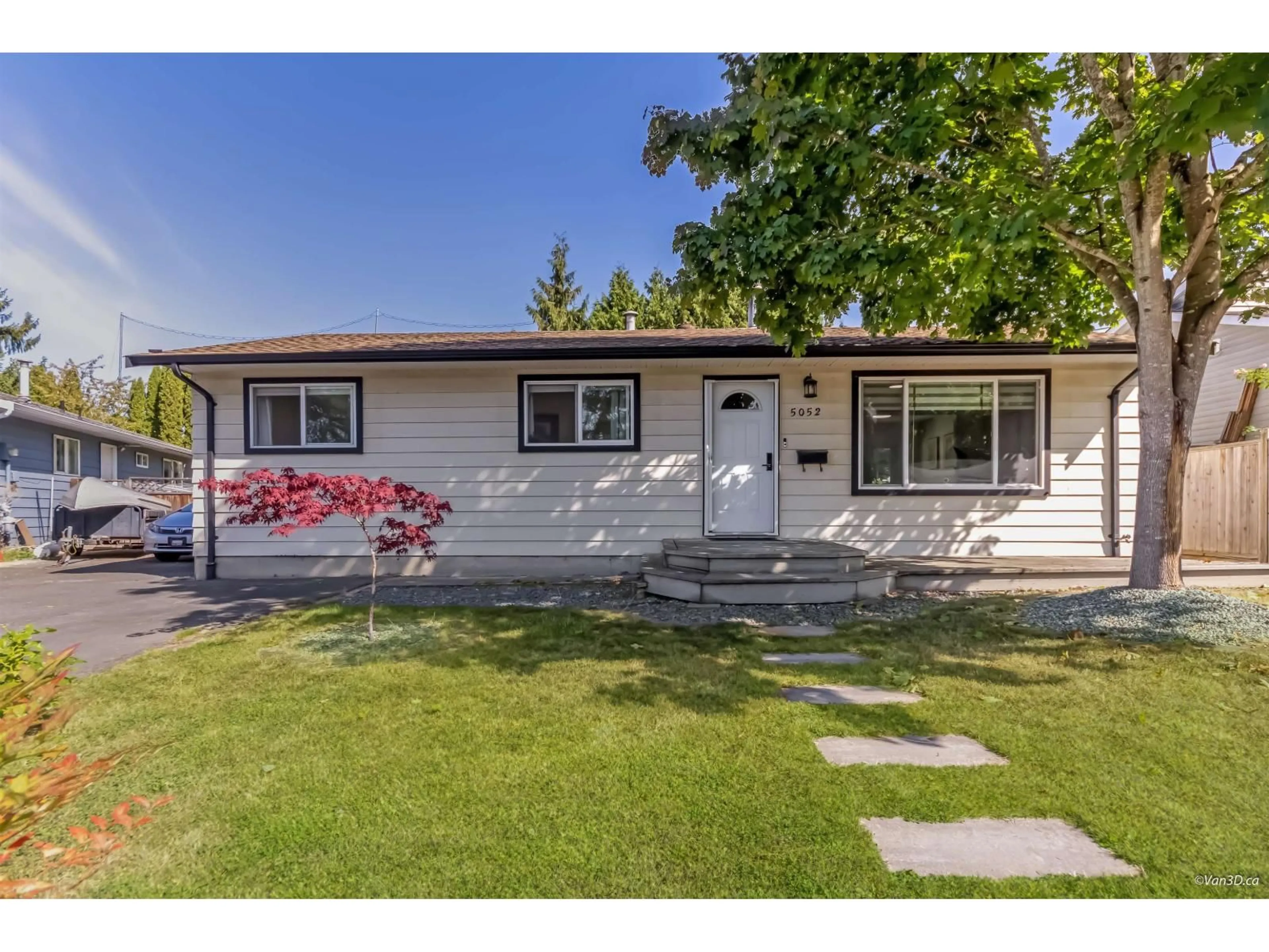 Home with vinyl exterior material, street for 5052 205B STREET, Langley British Columbia V3A6Z5