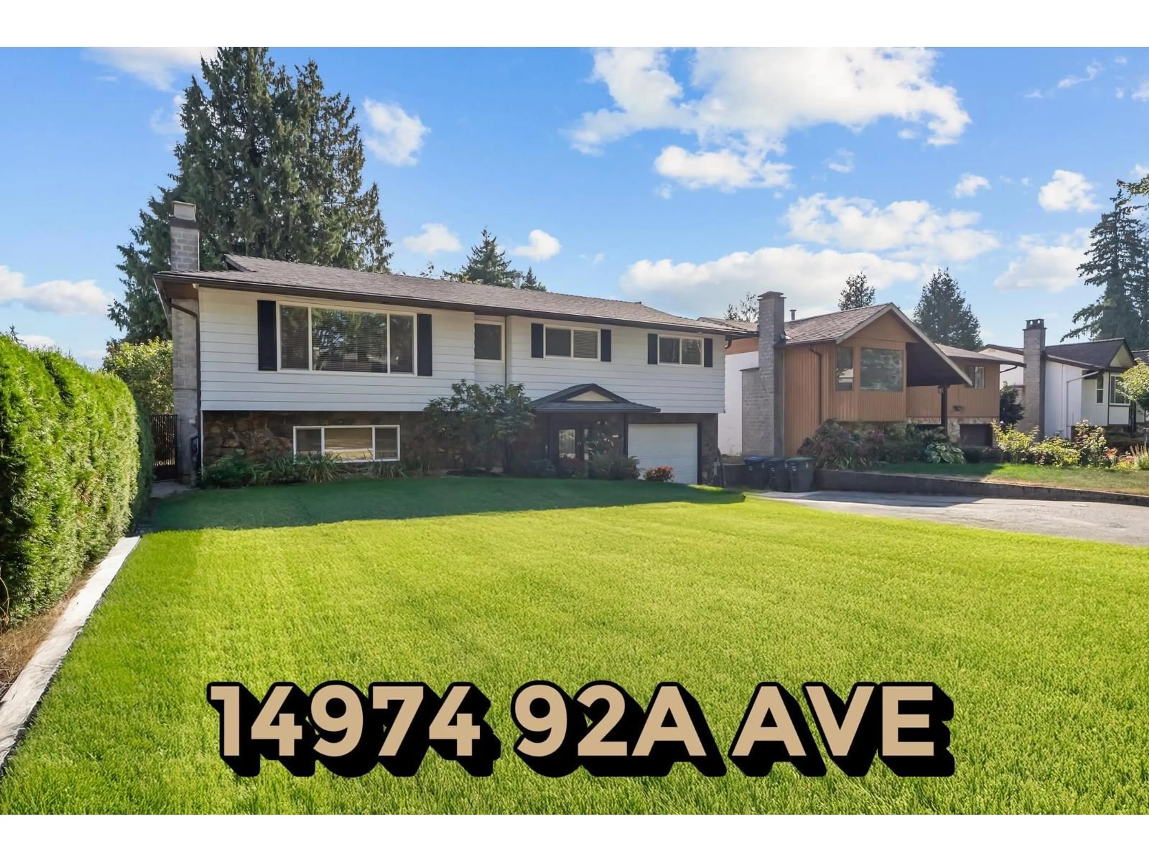 Home with vinyl exterior material, street for 14974 92A AVENUE, Surrey British Columbia V3R7A5