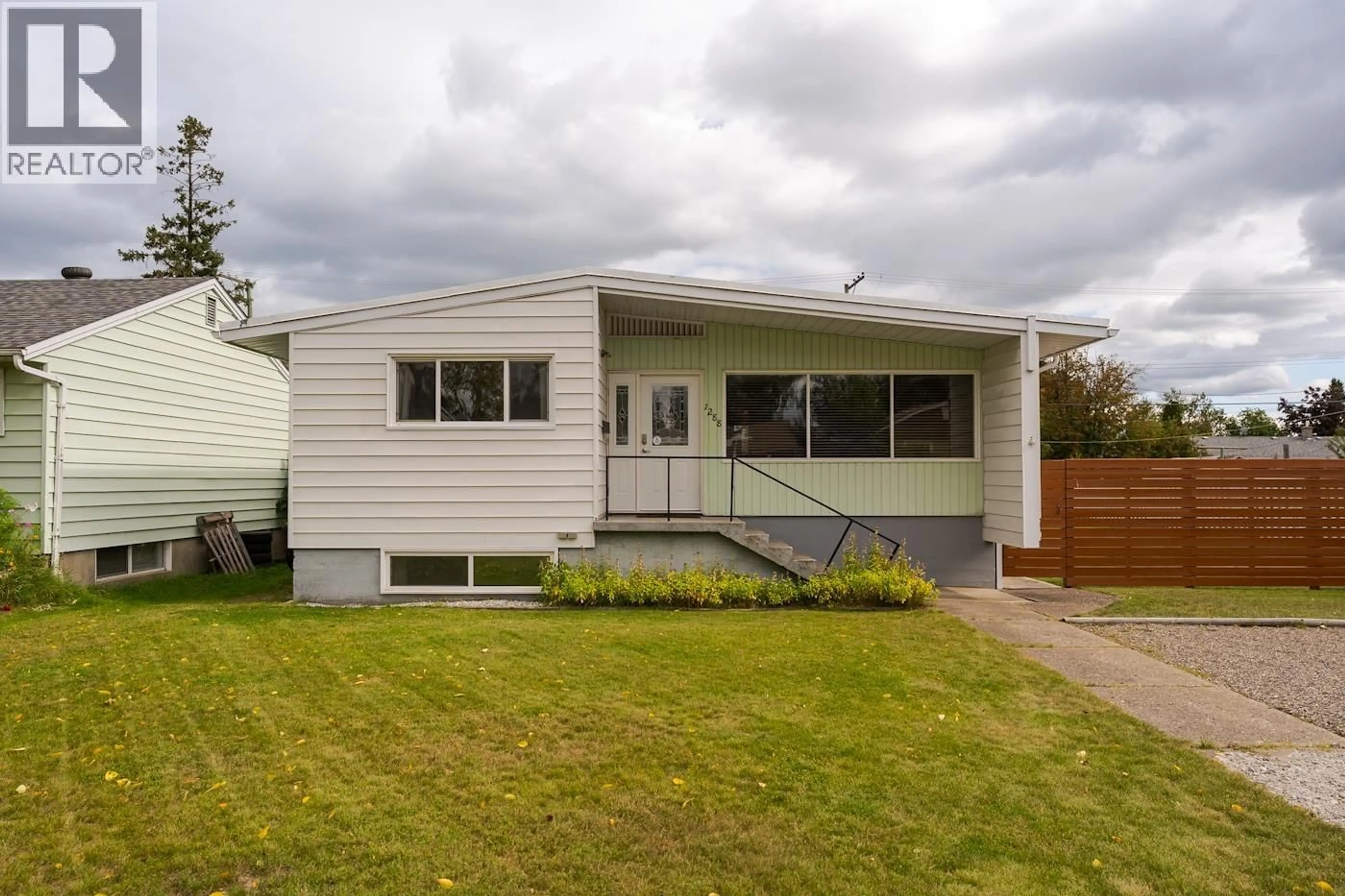 Home with vinyl exterior material, street for 1288 EWERT STREET, Prince George British Columbia V2M2P5