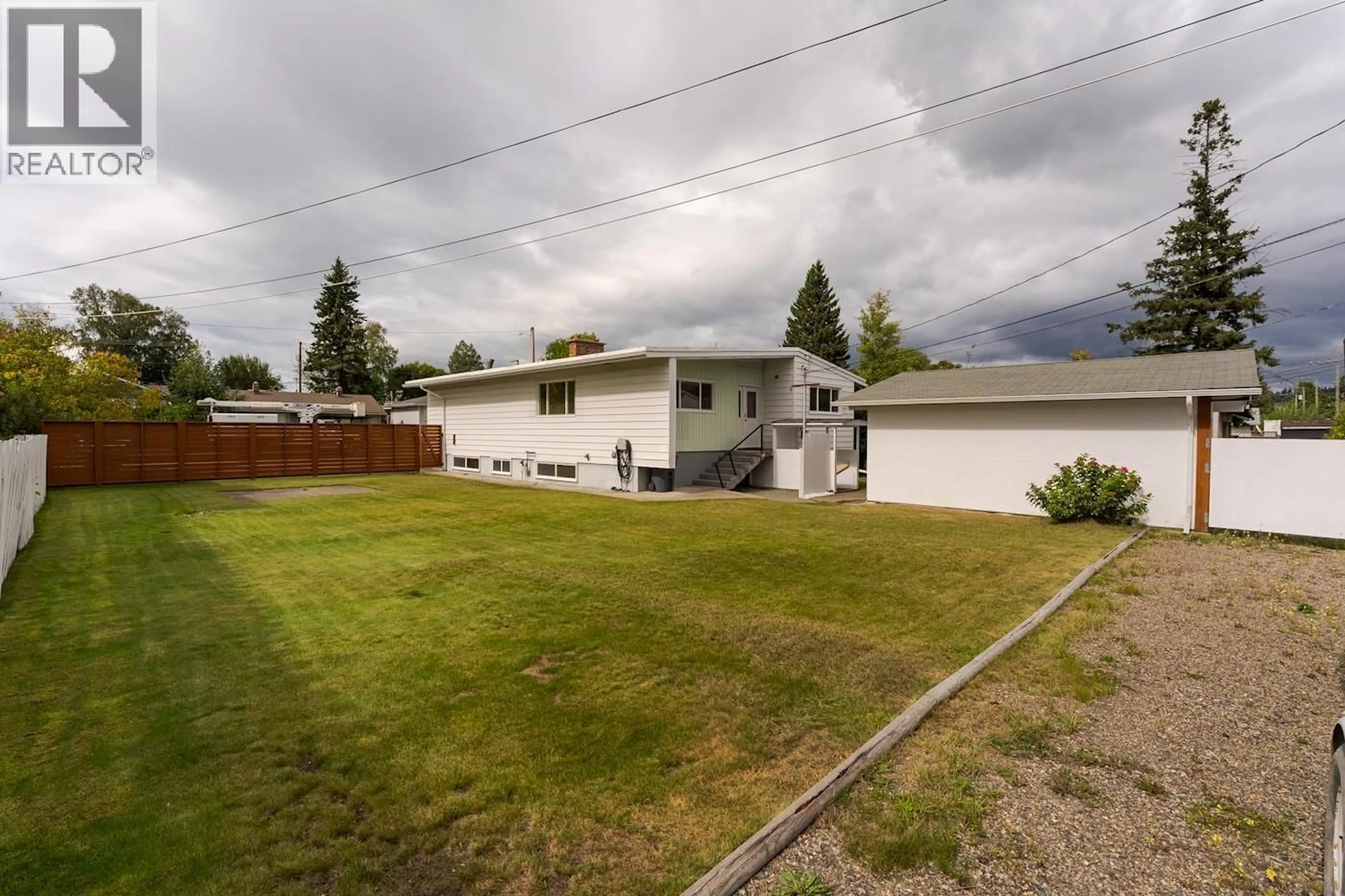 A pic from outside/outdoor area/front of a property/back of a property/a pic from drone, mountain view for 1288 EWERT STREET, Prince George British Columbia V2M2P5