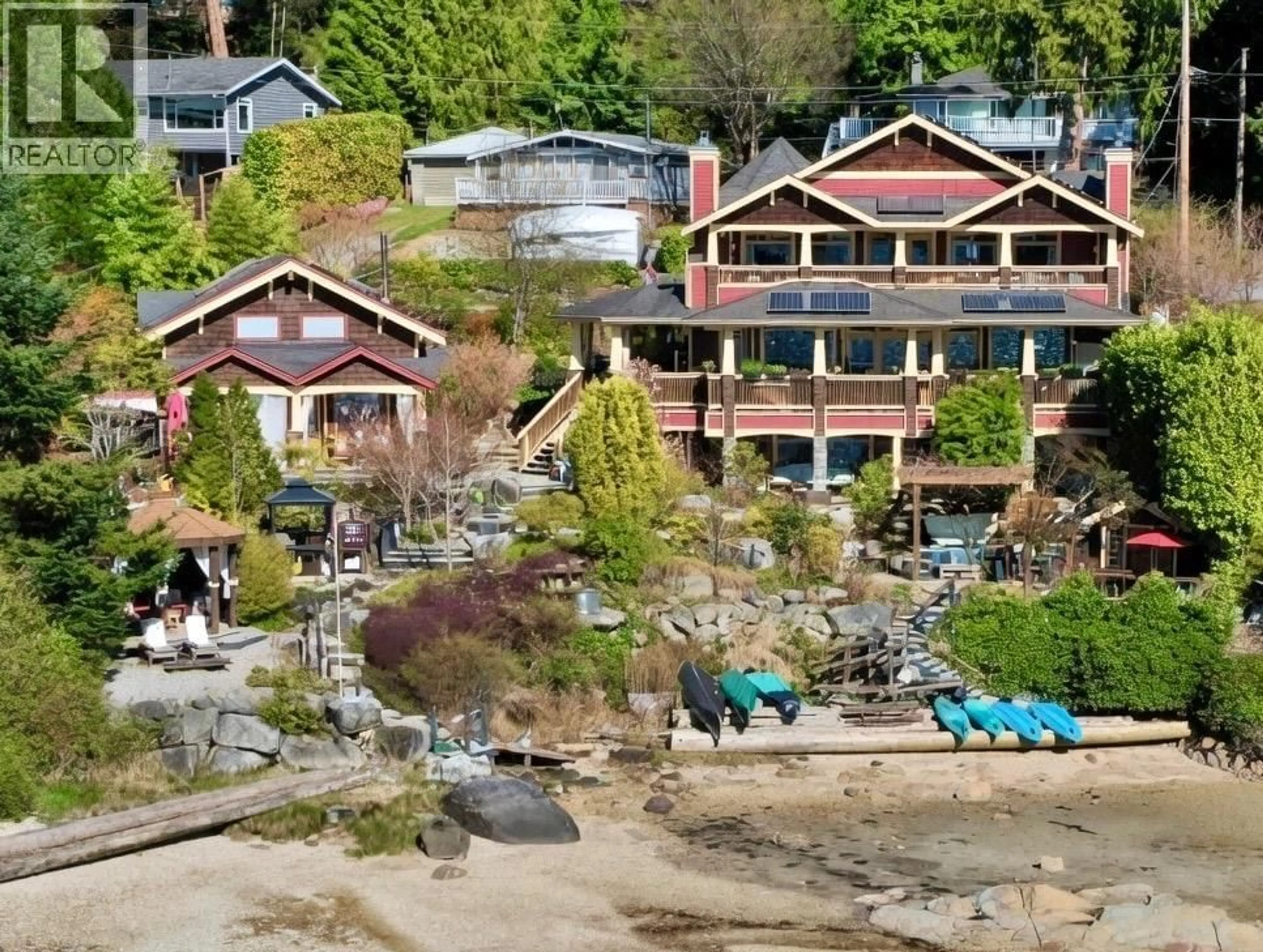 A pic from outside/outdoor area/front of a property/back of a property/a pic from drone, water/lake/river/ocean view for 7545 ISLETS PLACE, Sechelt British Columbia V7Z0C5