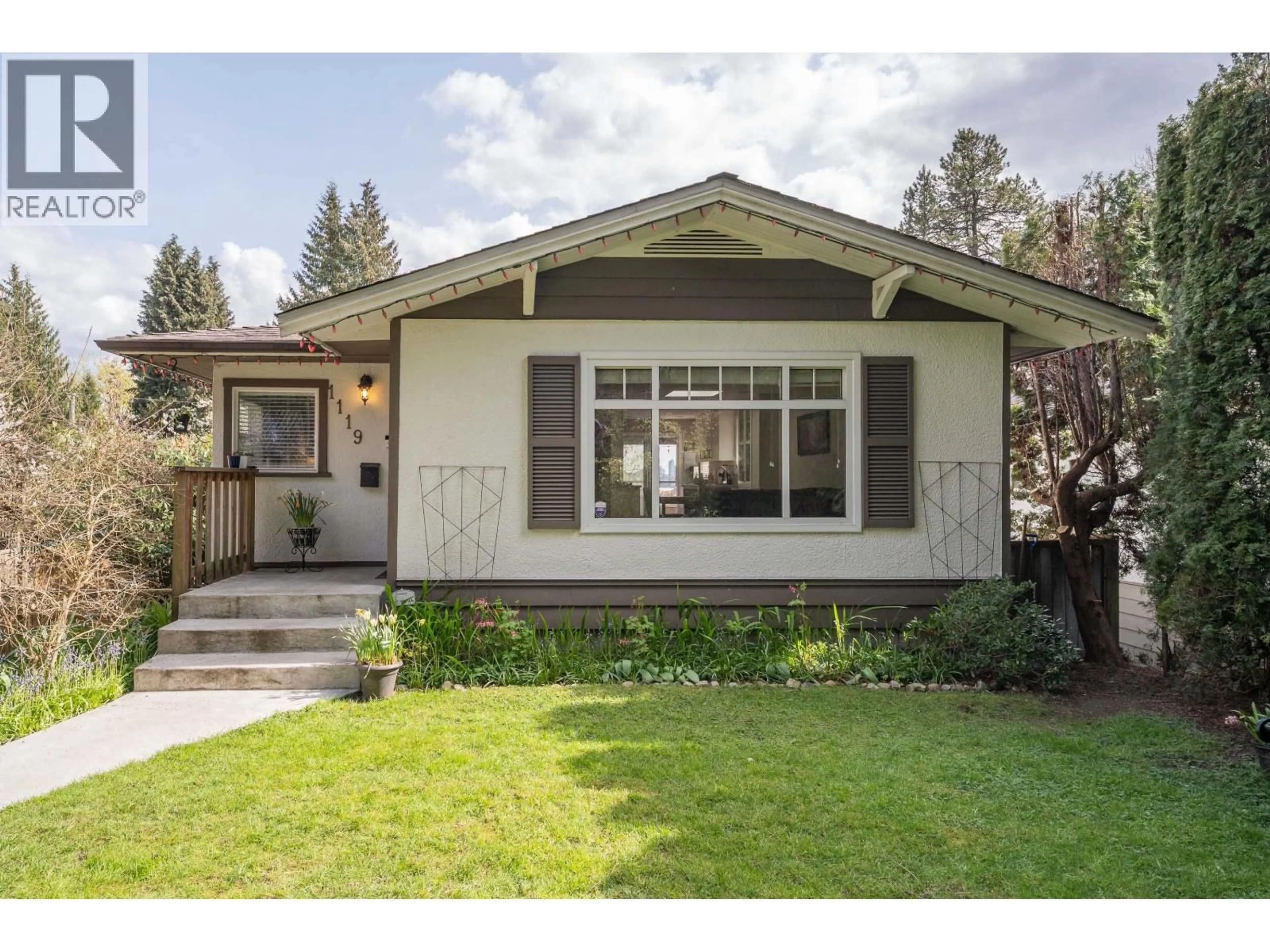 Home with vinyl exterior material, street for 1119 CLOVERLEY STREET, North Vancouver British Columbia V7L1N7