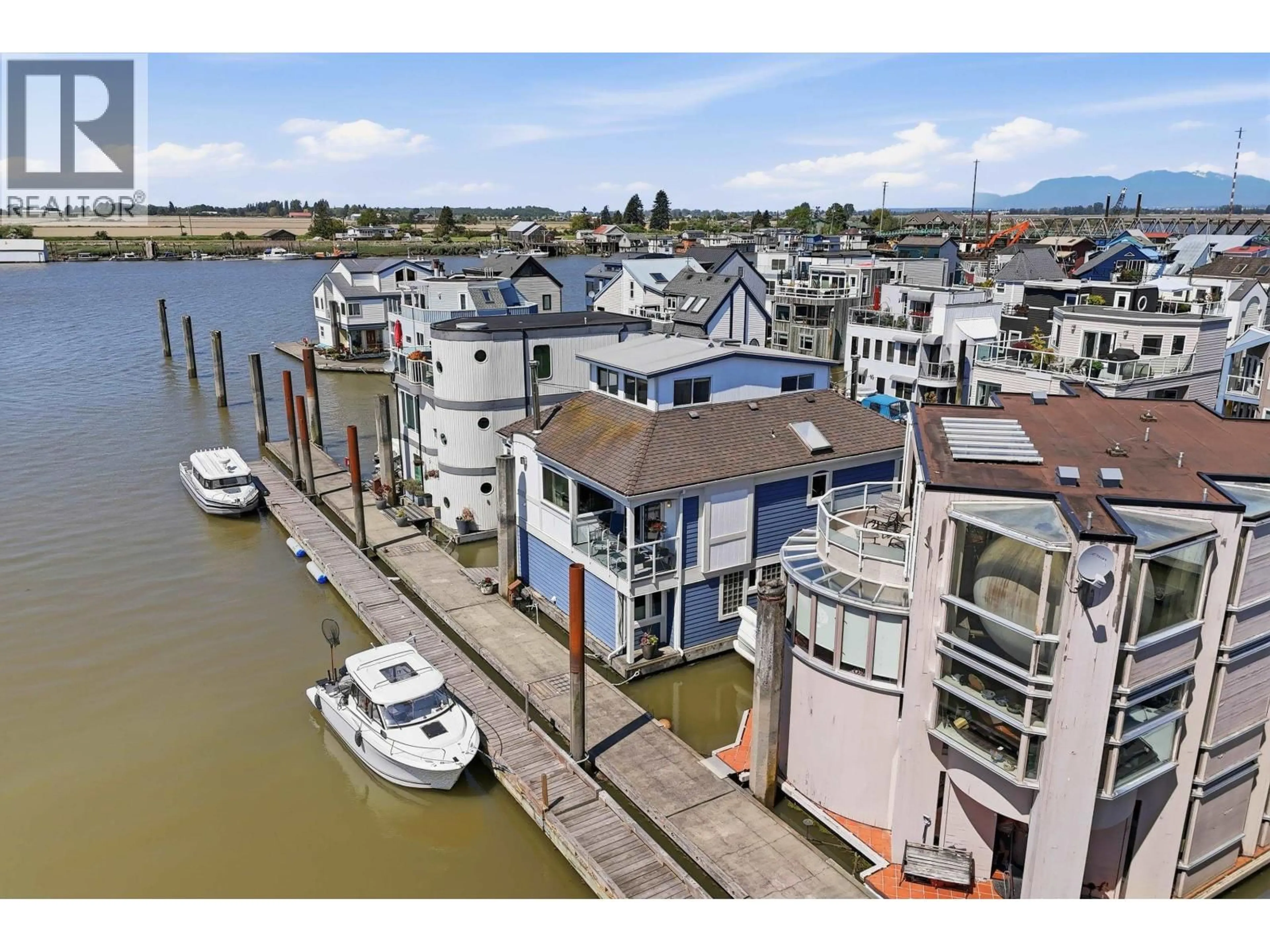 A pic from outside/outdoor area/front of a property/back of a property/a pic from drone, water/lake/river/ocean view for 5 - 3459 RIVER ROAD, Delta British Columbia V4K4Y6