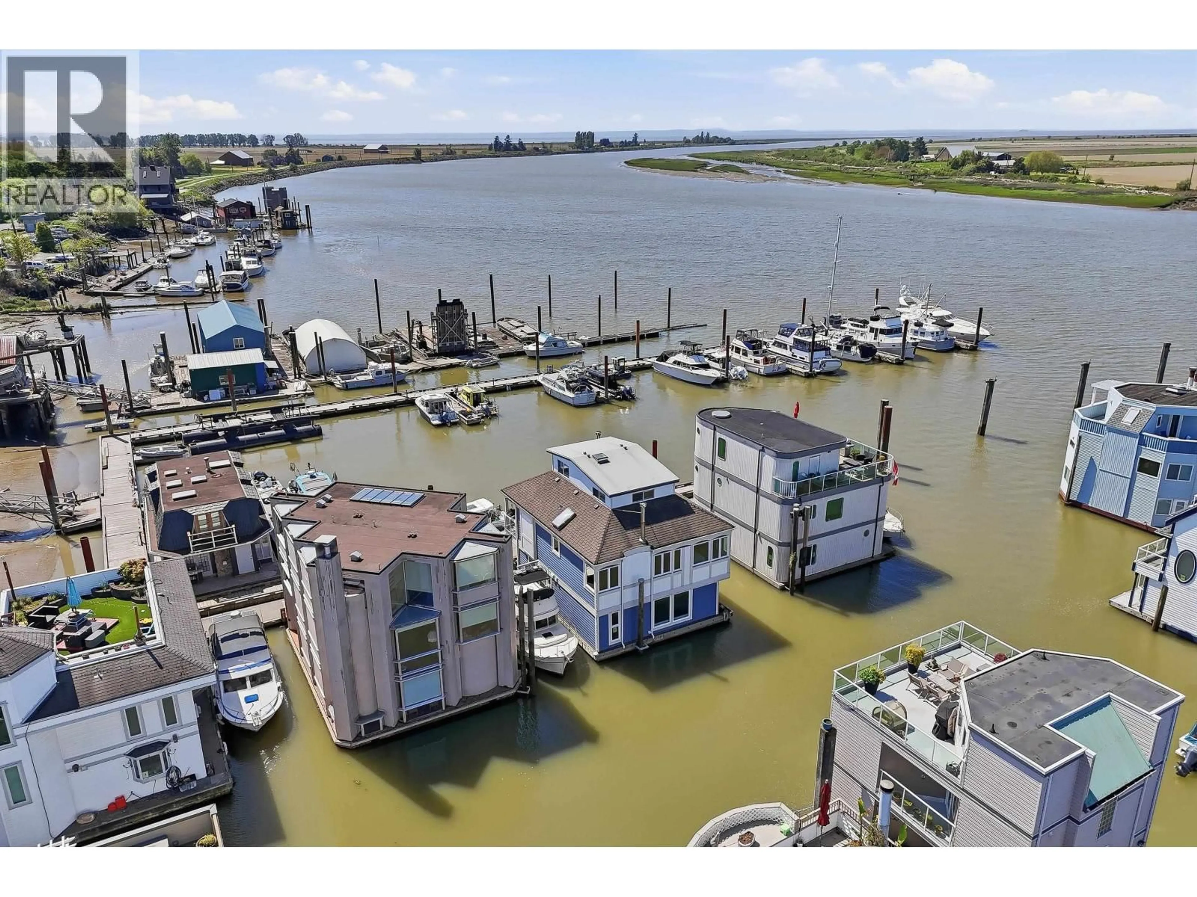 A pic from outside/outdoor area/front of a property/back of a property/a pic from drone, water/lake/river/ocean view for 5 - 3459 RIVER ROAD, Delta British Columbia V4K4Y6