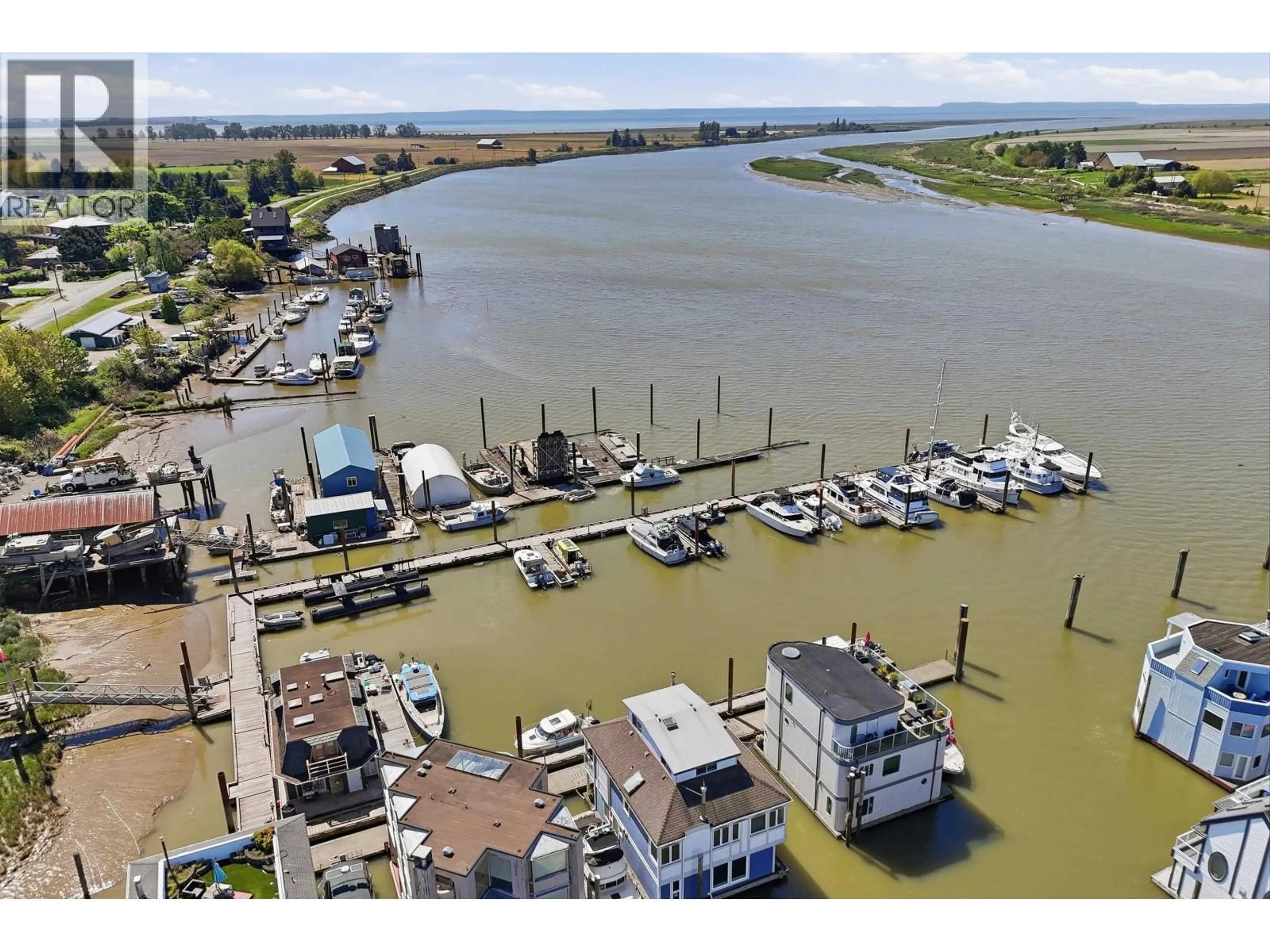 A pic from outside/outdoor area/front of a property/back of a property/a pic from drone, water/lake/river/ocean view for 5 - 3459 RIVER ROAD, Delta British Columbia V4K4Y6