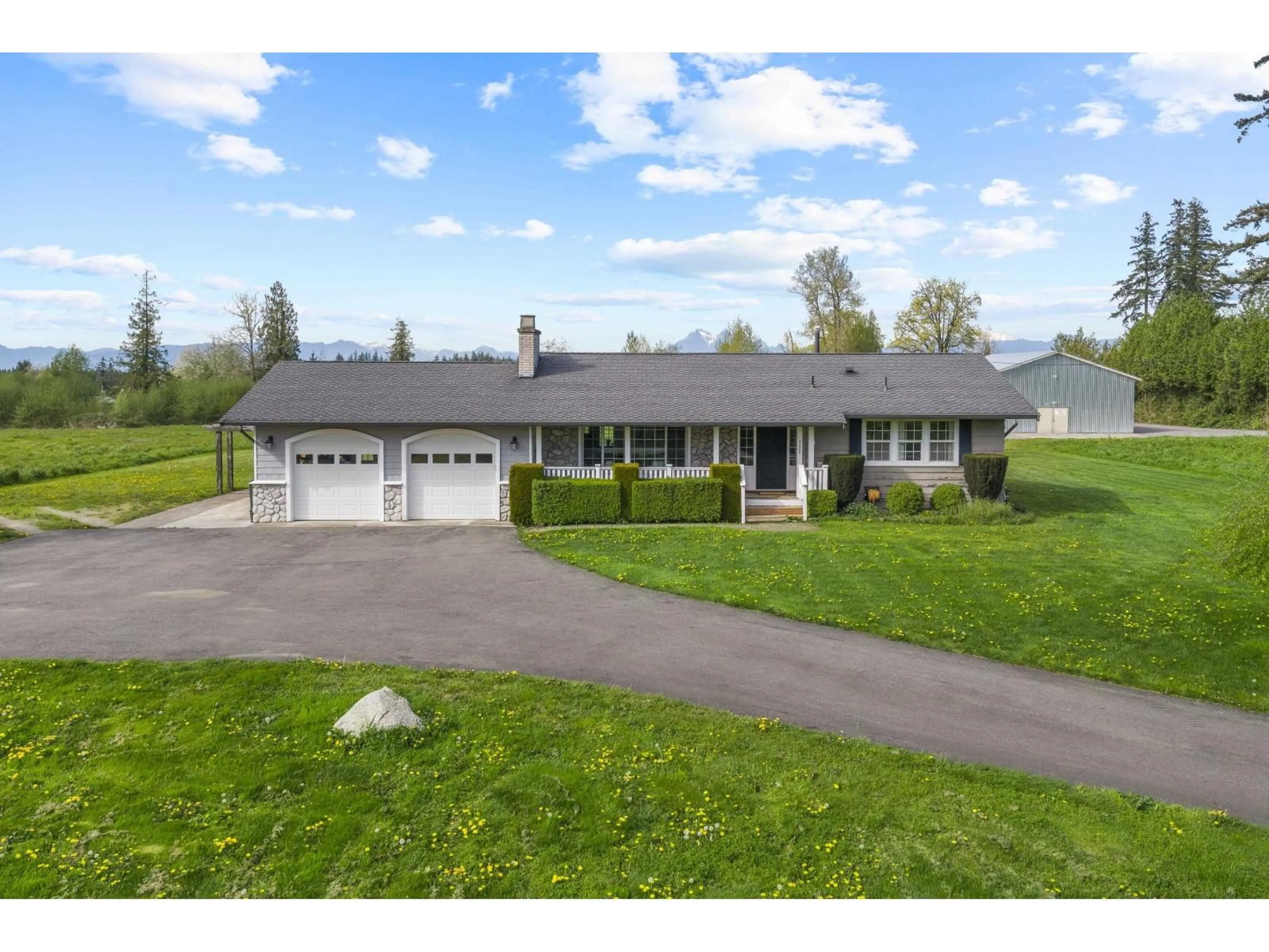 A pic from outside/outdoor area/front of a property/back of a property/a pic from drone, street for 24985 32 AVENUE, Langley British Columbia V4W2A1
