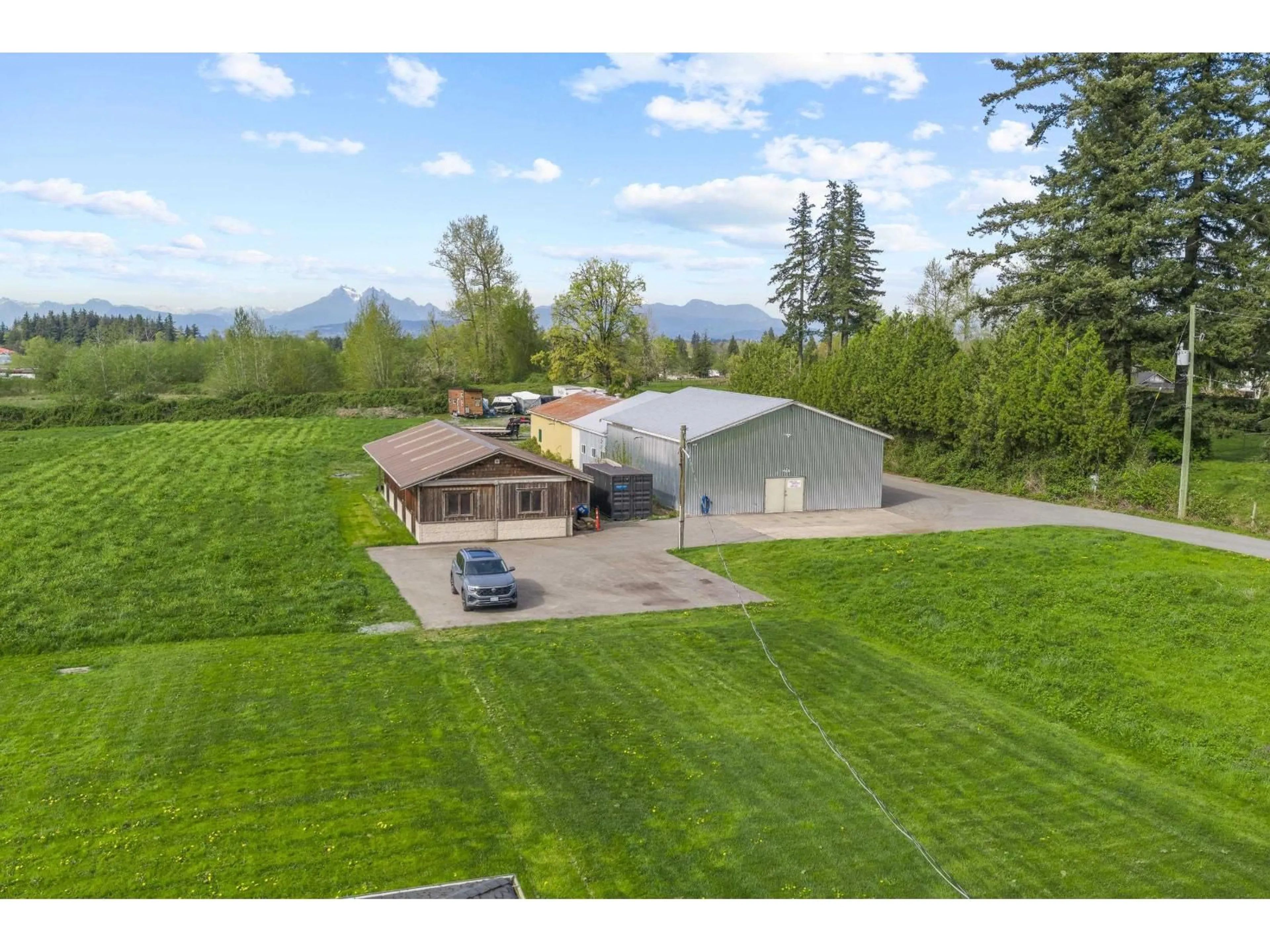 A pic from outside/outdoor area/front of a property/back of a property/a pic from drone, mountain view for 24985 32 AVENUE, Langley British Columbia V4W2A1