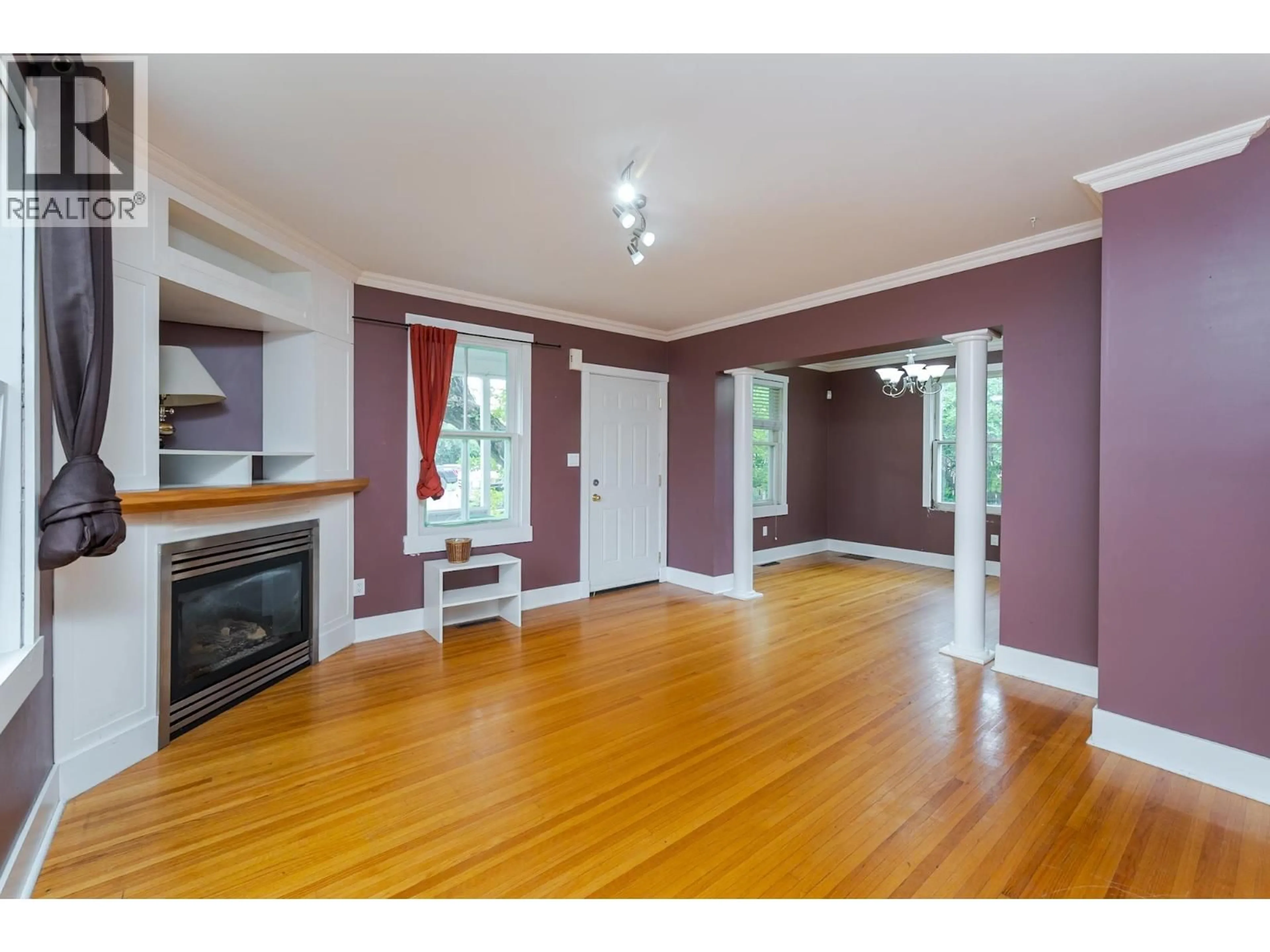 Living room with furniture, wood/laminate floor for 1684 5TH AVENUE, Prince George British Columbia V2L3M1