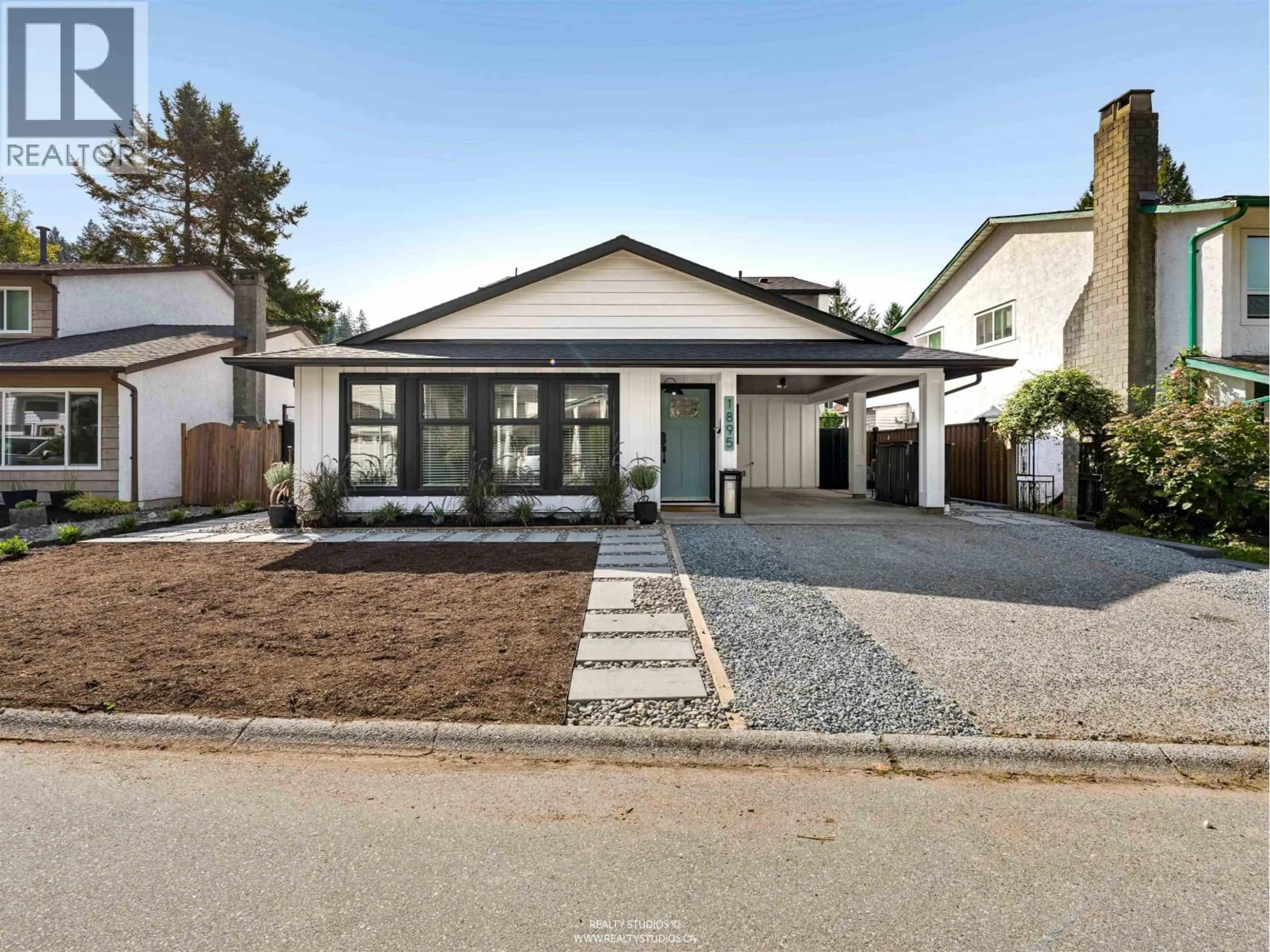 Home with brick exterior material, street for 1895 BOW DRIVE, Coquitlam British Columbia V3E1P7