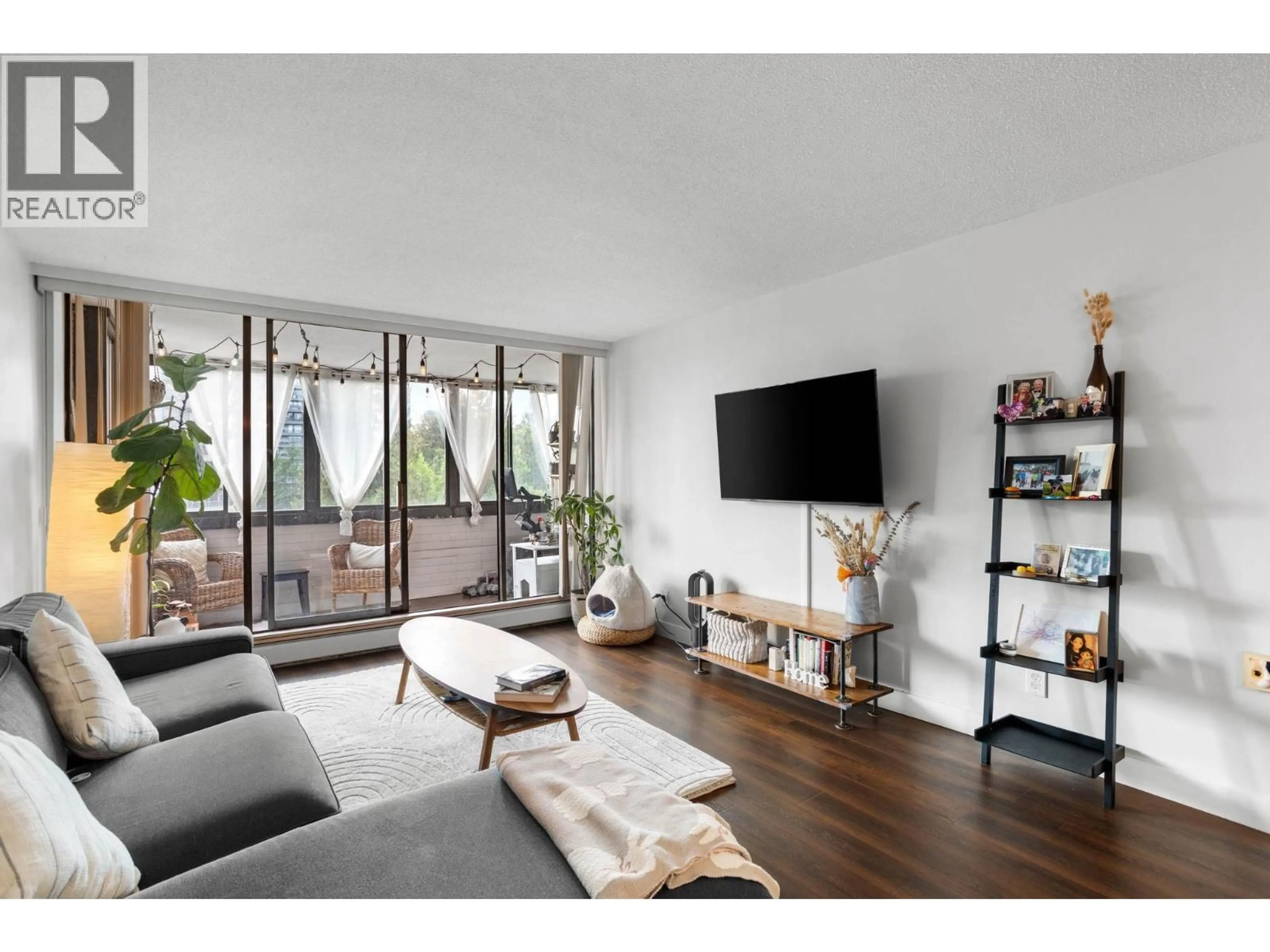Living room with furniture, wood/laminate floor for 906 - 2020 BELLWOOD AVENUE, Burnaby British Columbia V5B4P8
