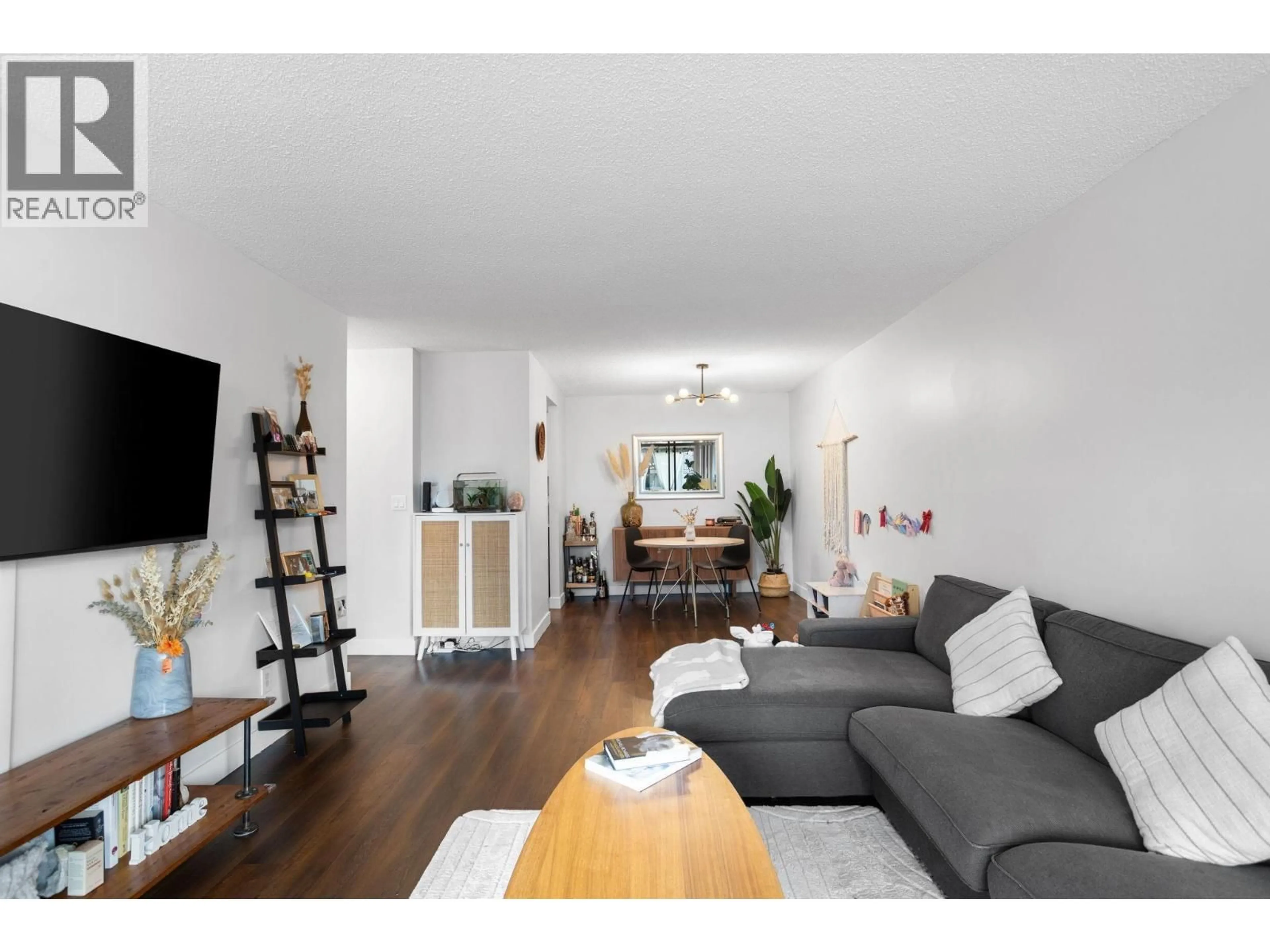 Living room with furniture, wood/laminate floor for 906 - 2020 BELLWOOD AVENUE, Burnaby British Columbia V5B4P8