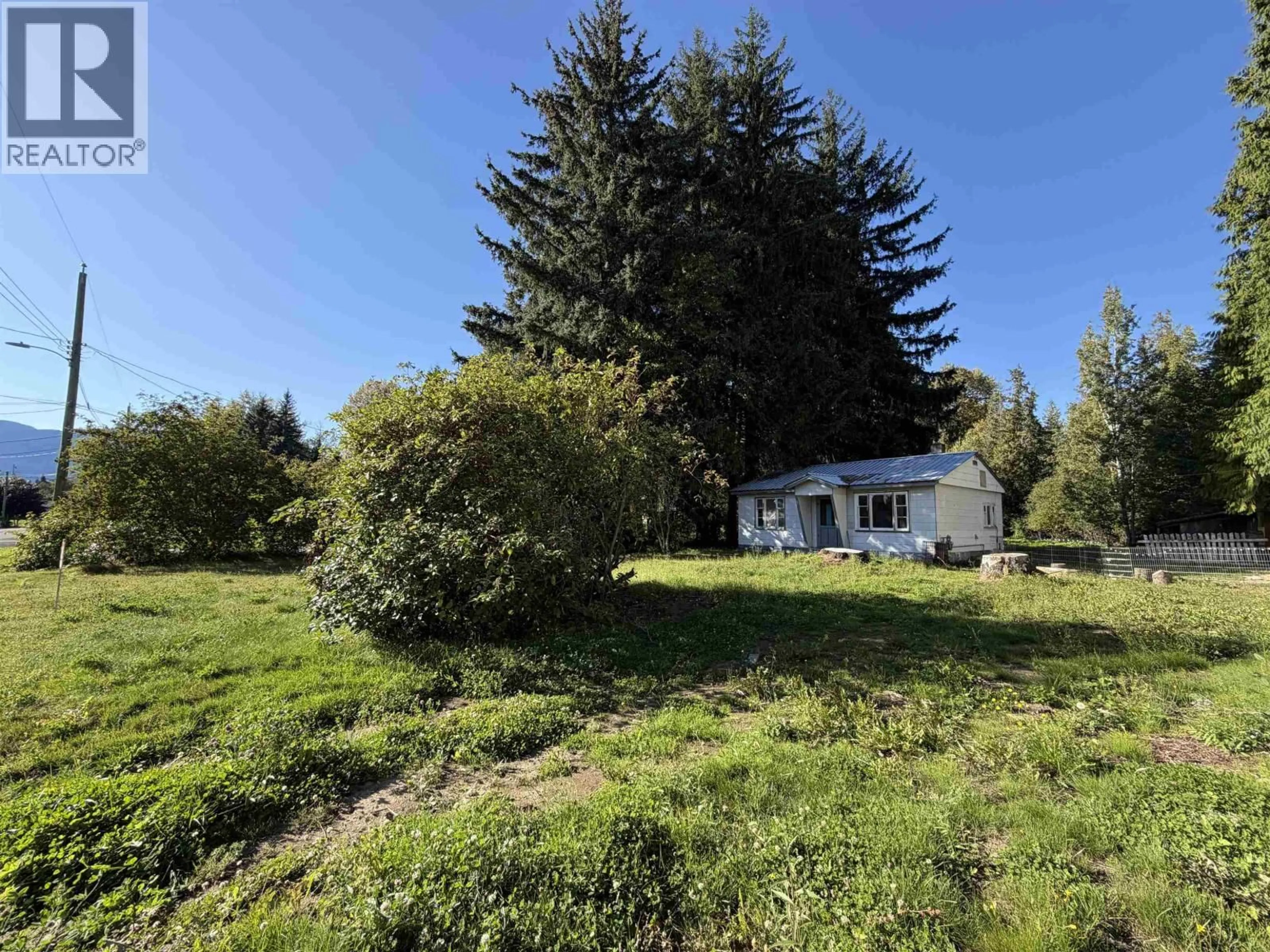 A pic from outside/outdoor area/front of a property/back of a property/a pic from drone, forest/trees view for 5112 MEDEEK AVENUE, Terrace British Columbia V8G1E1