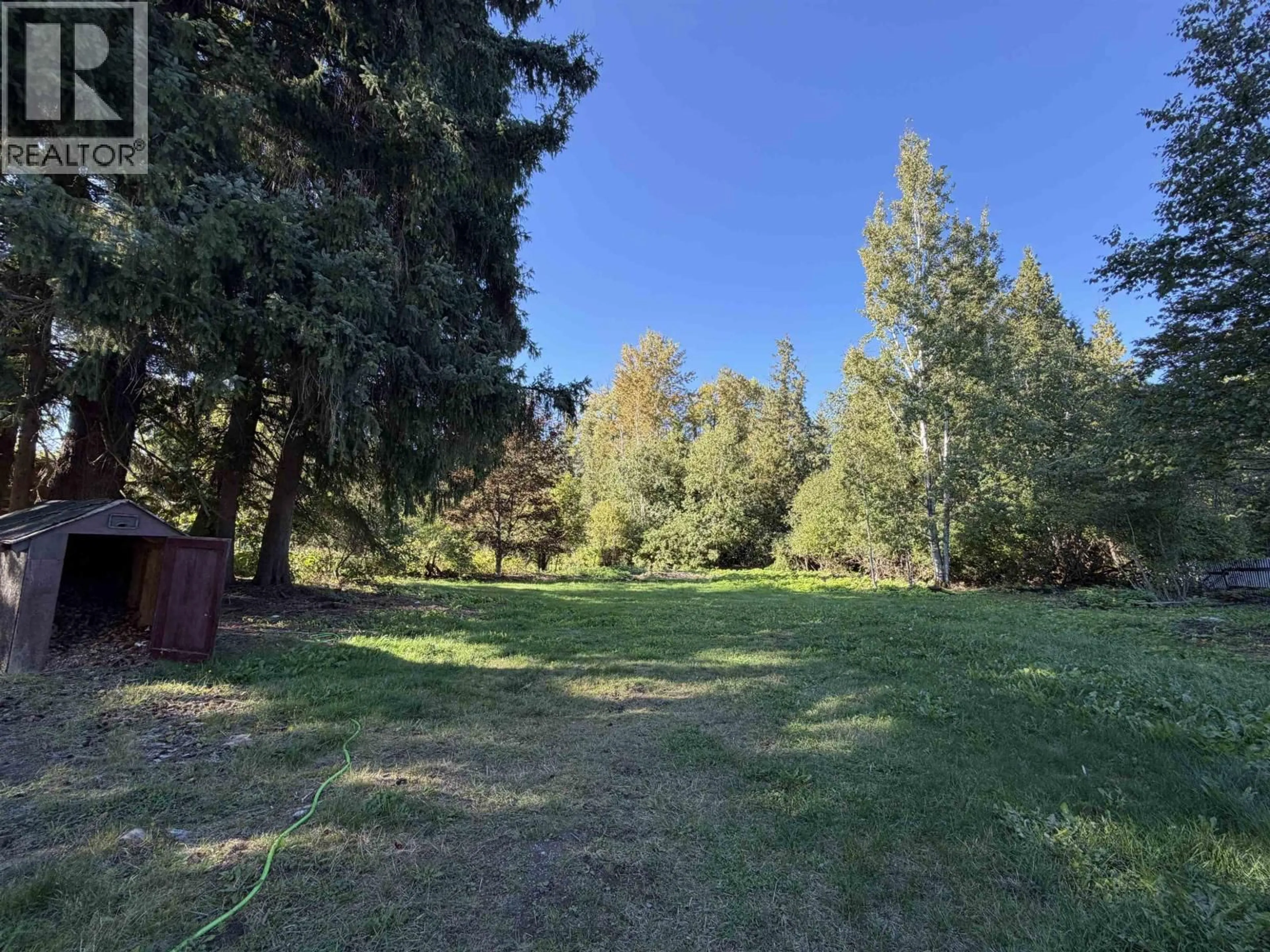A pic from outside/outdoor area/front of a property/back of a property/a pic from drone, forest/trees view for 5112 MEDEEK AVENUE, Terrace British Columbia V8G1E1