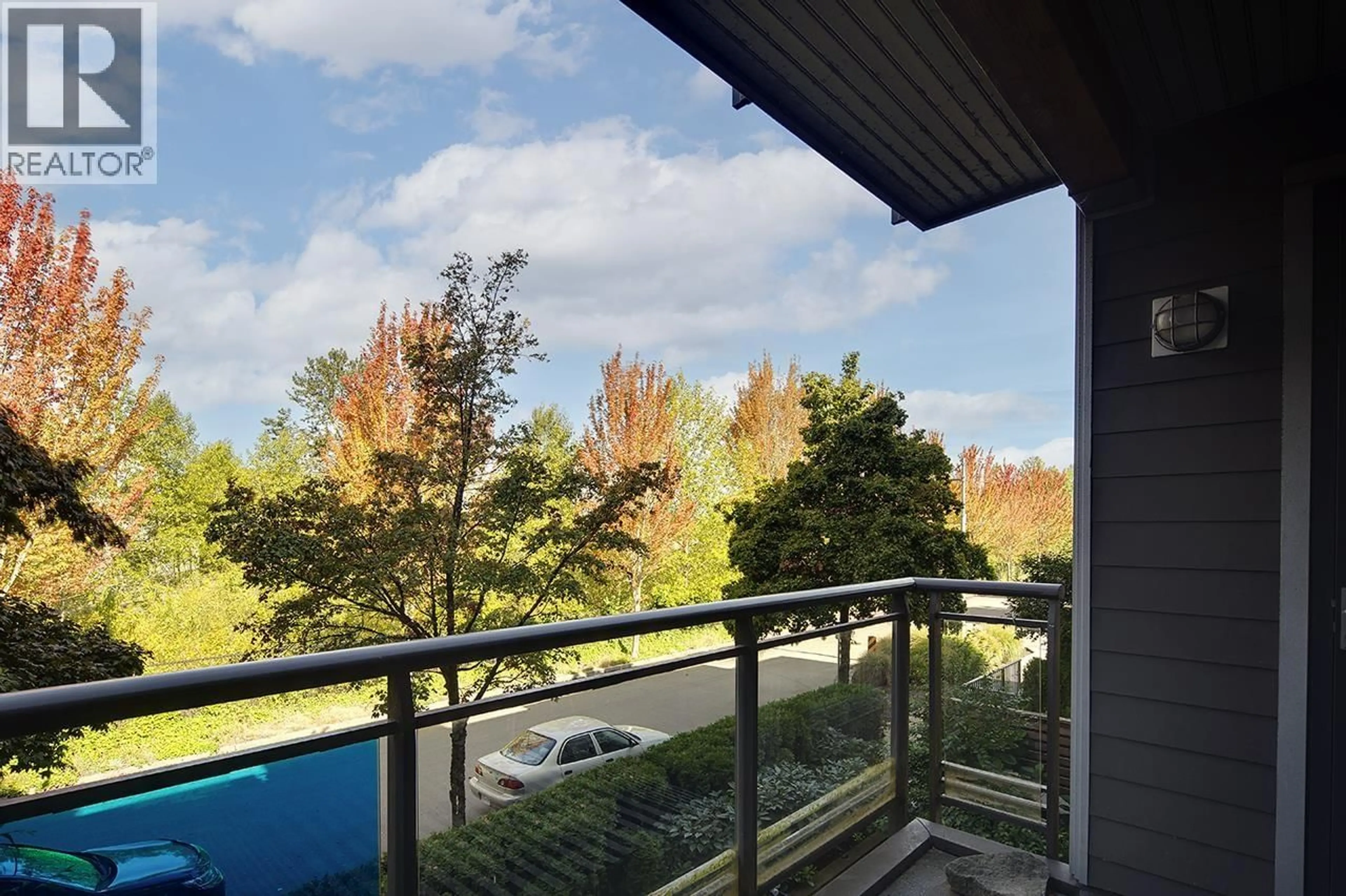 Balcony in the apartment, forest/trees view for 205 - 14300 RIVERPORT WAY, Richmond British Columbia V6W0A4