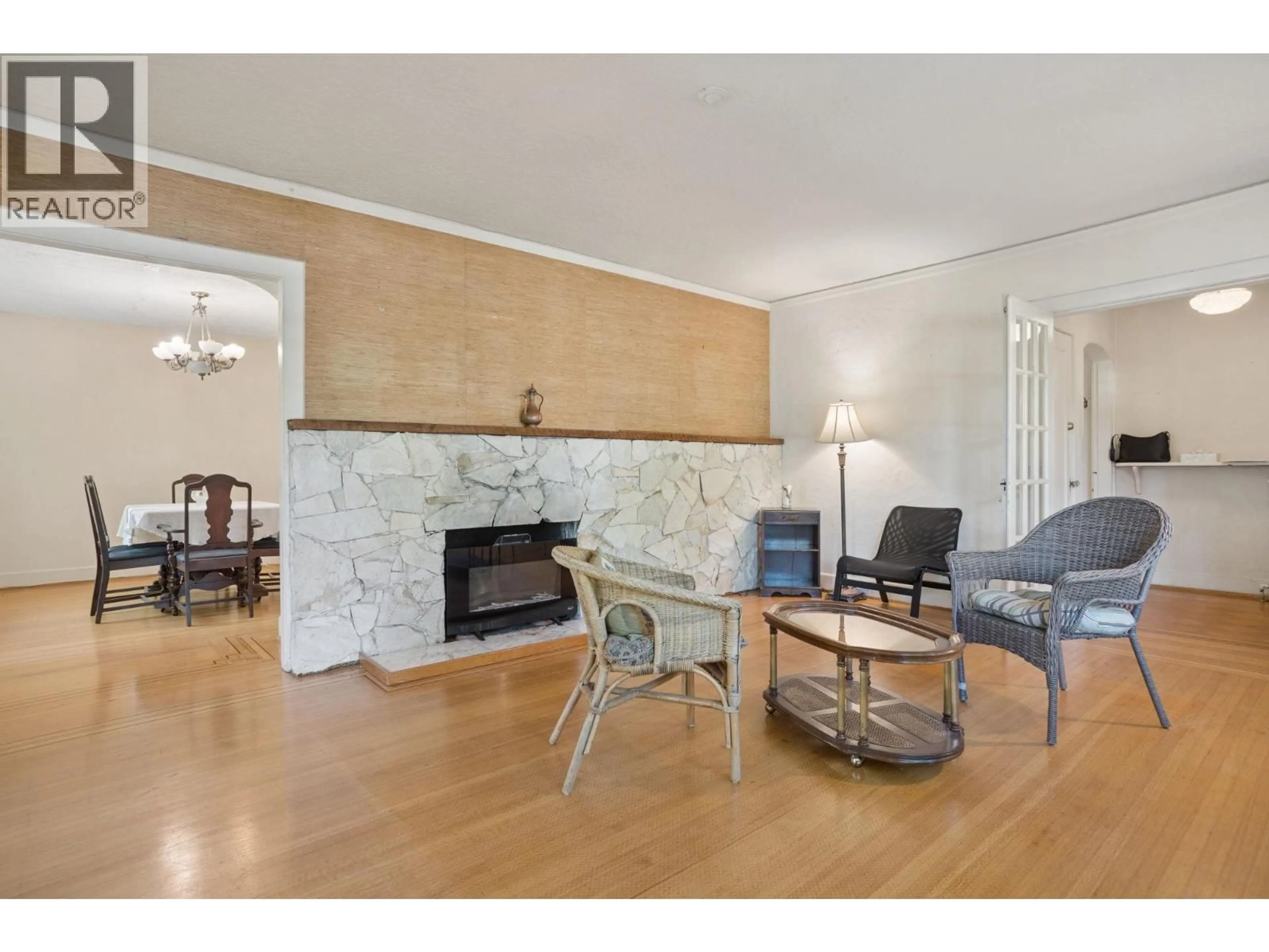 Living room with furniture, wood/laminate floor for 1844 ACADIA ROAD, Vancouver British Columbia V6T1R3