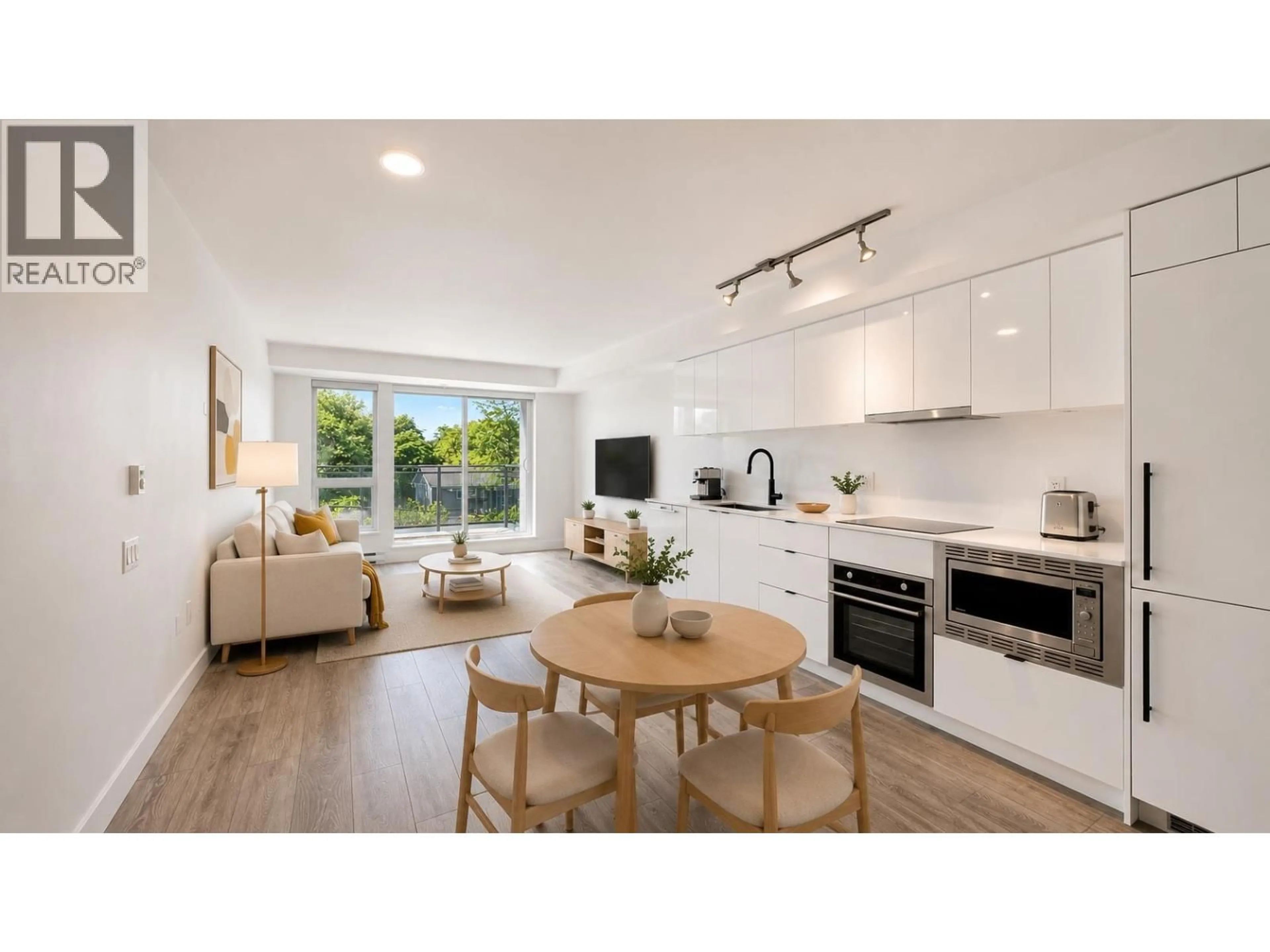 Open concept kitchen, wood/laminate floor for 308 - 630 BROADWAY, Vancouver British Columbia V5T0J1