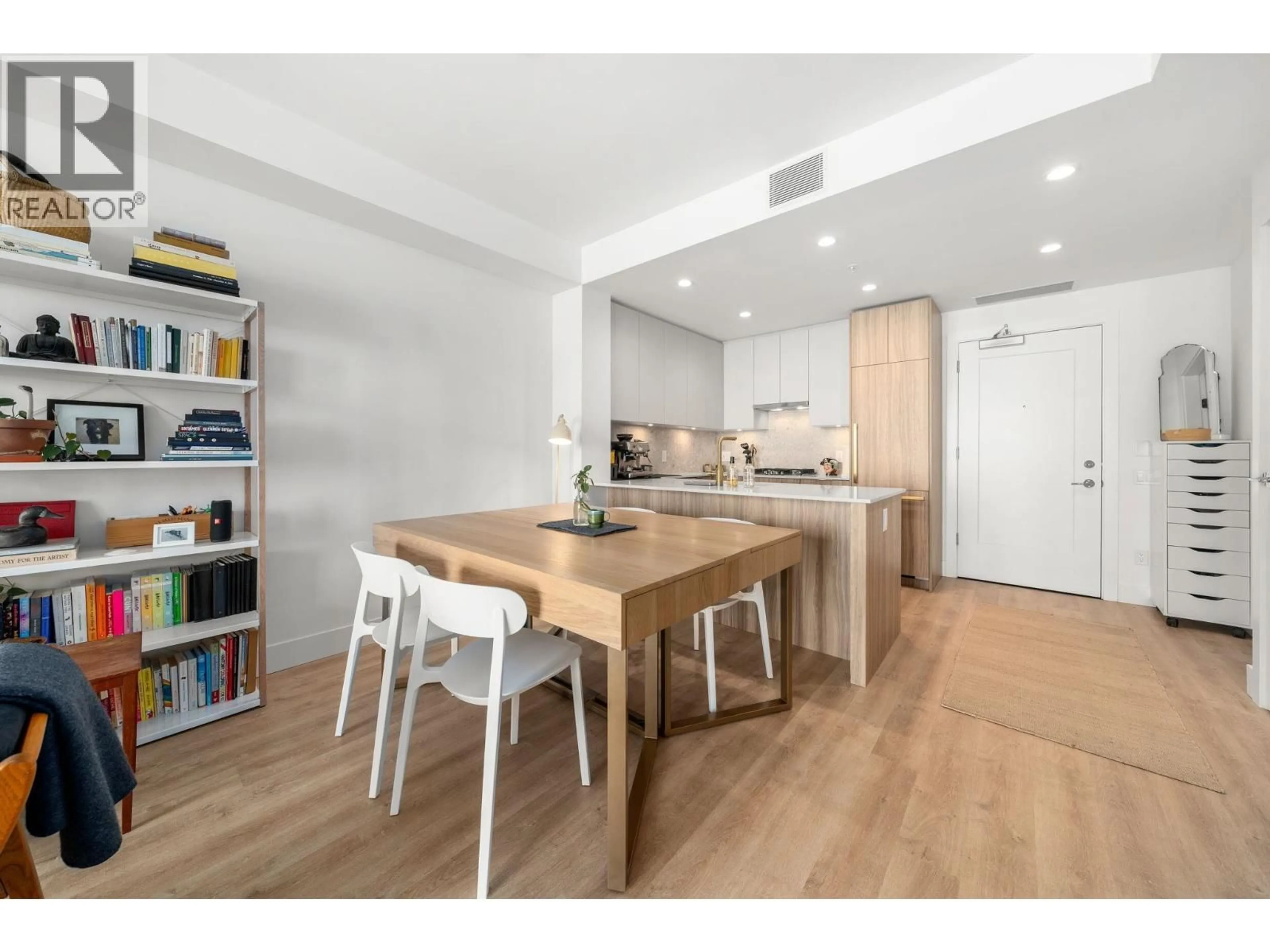 Open concept kitchen, wood/laminate floor for 405 - 2385 EMERY COURT, North Vancouver British Columbia V7J1P9