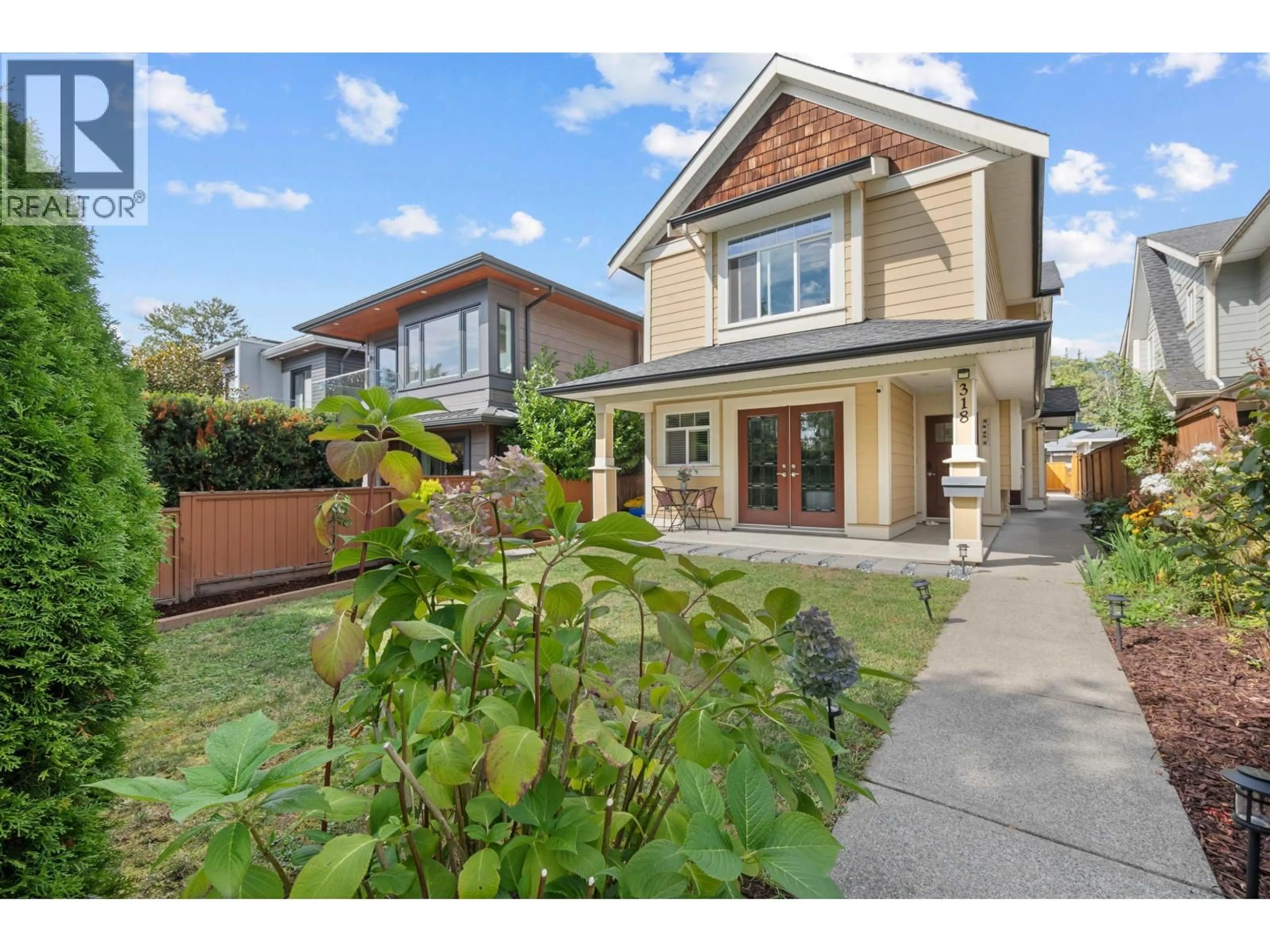 Home with brick exterior material, street for 318 18TH STREET, North Vancouver British Columbia V7M1W9