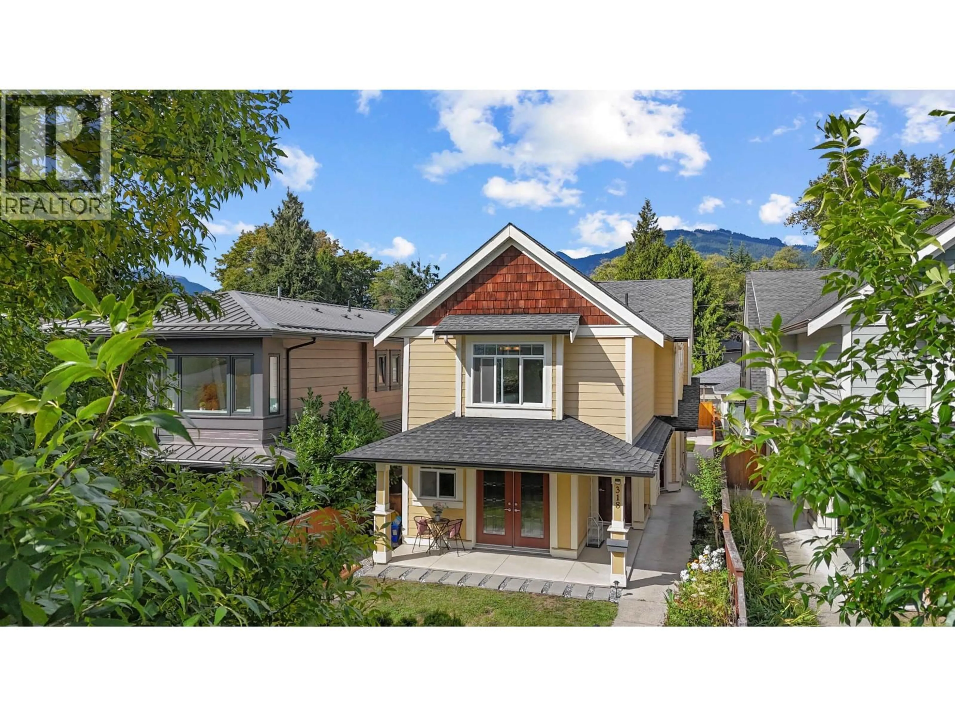 A pic from outside/outdoor area/front of a property/back of a property/a pic from drone, street for 318 18TH STREET, North Vancouver British Columbia V7M1W9