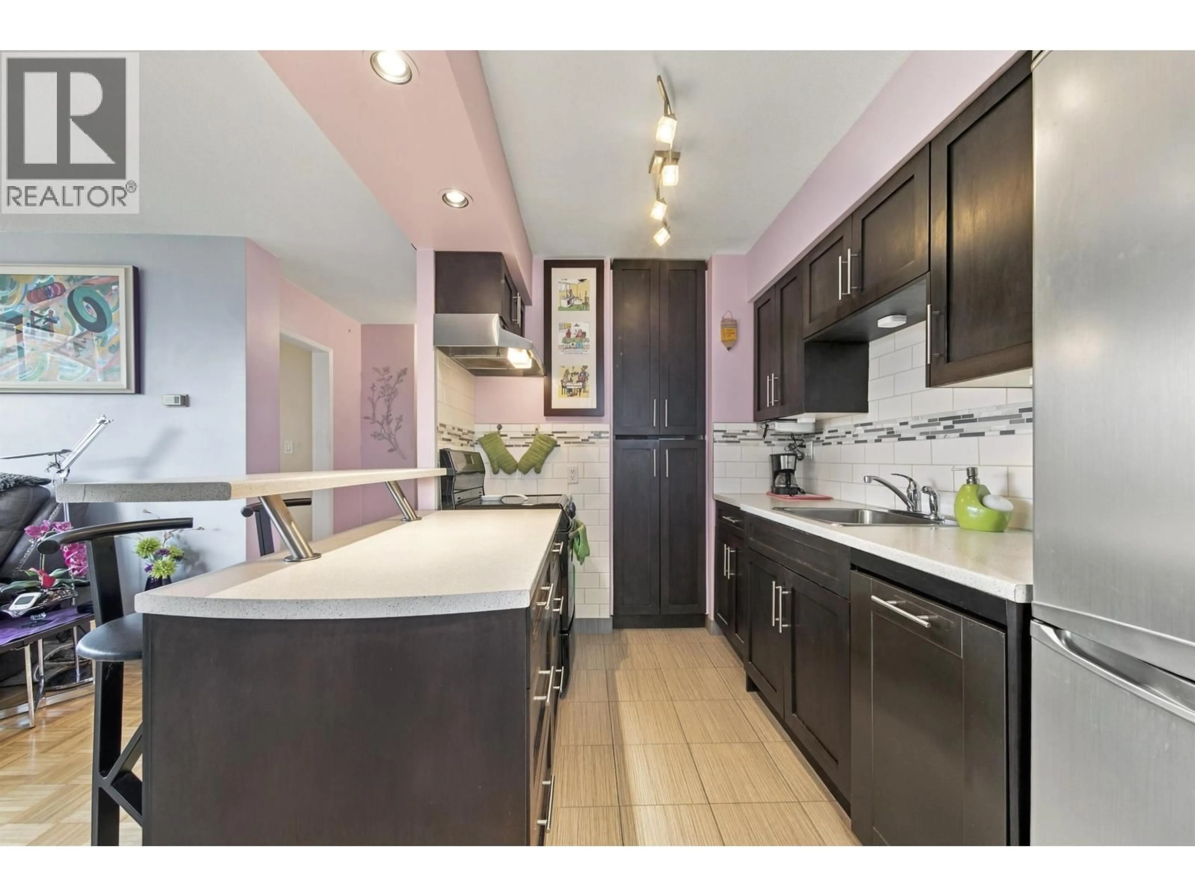 Open concept kitchen, ceramic/tile floor for 705 - 1251 CARDERO STREET, Vancouver British Columbia V6G2H9