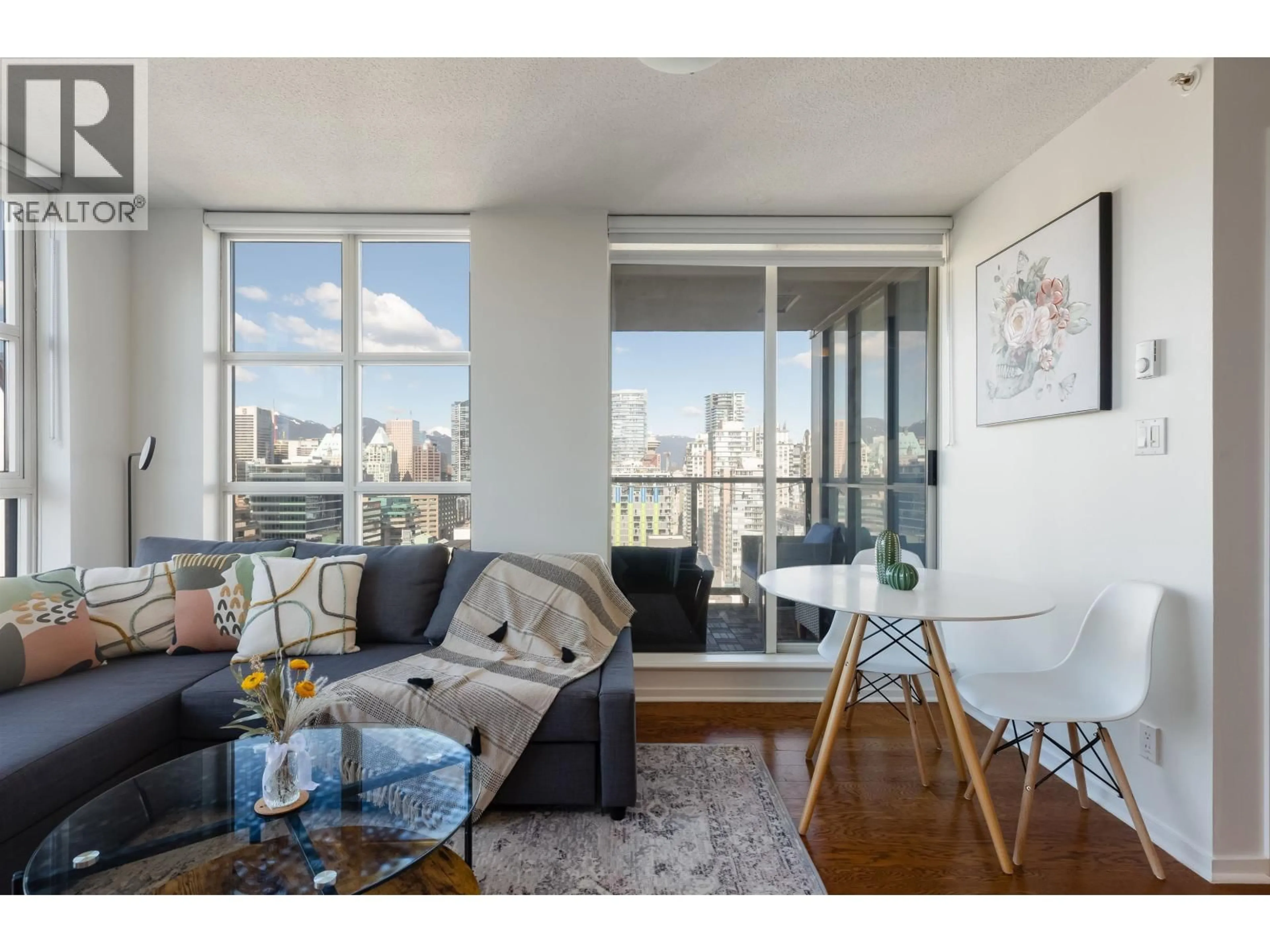 Living room with furniture, wood/laminate floor for 2402 - 1155 SEYMOUR STREET, Vancouver British Columbia V6B1K2
