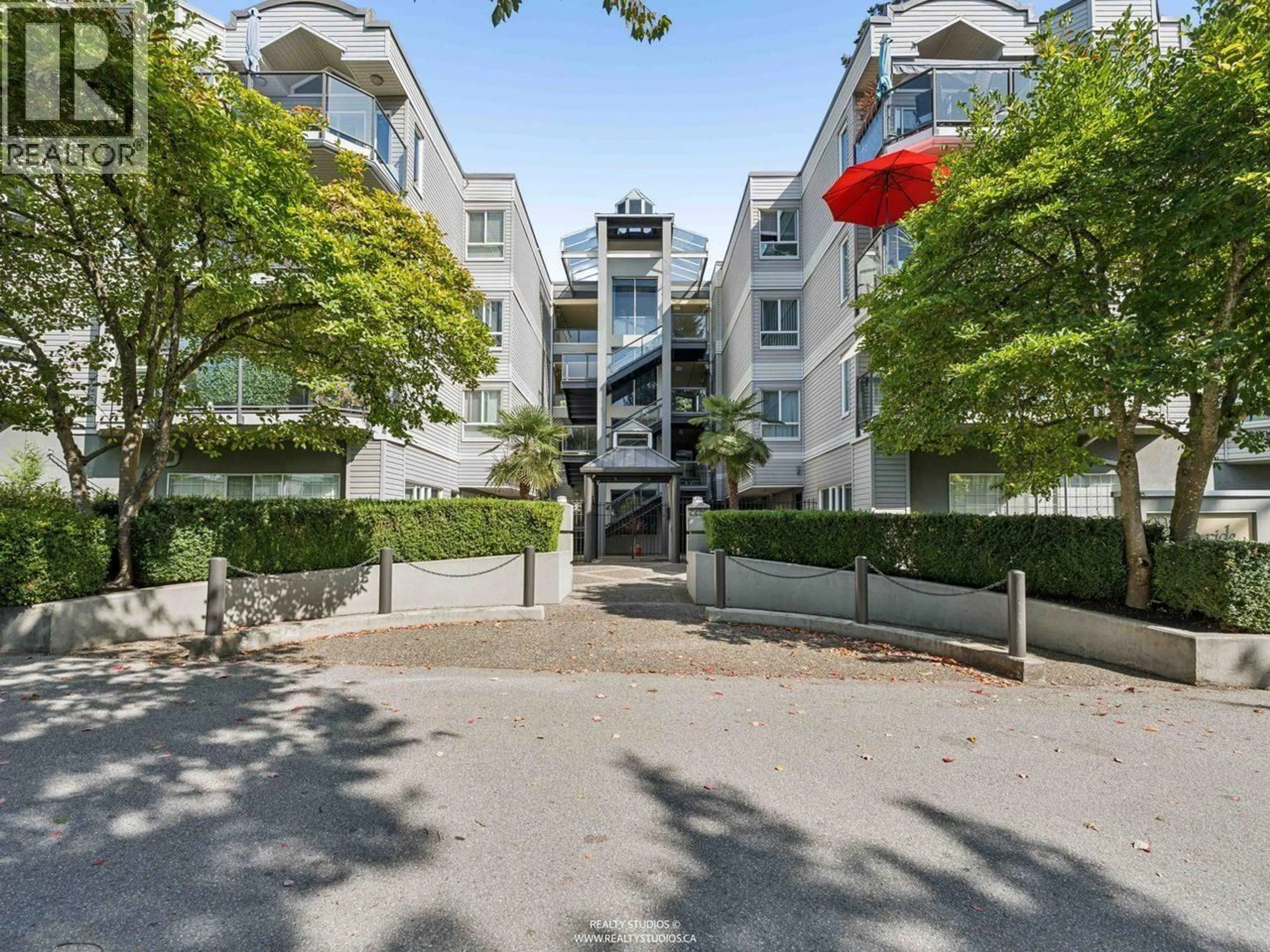 A pic from outside/outdoor area/front of a property/back of a property/a pic from drone, street for 111 - 2250 MARINE DRIVE, Vancouver British Columbia V5P2S2