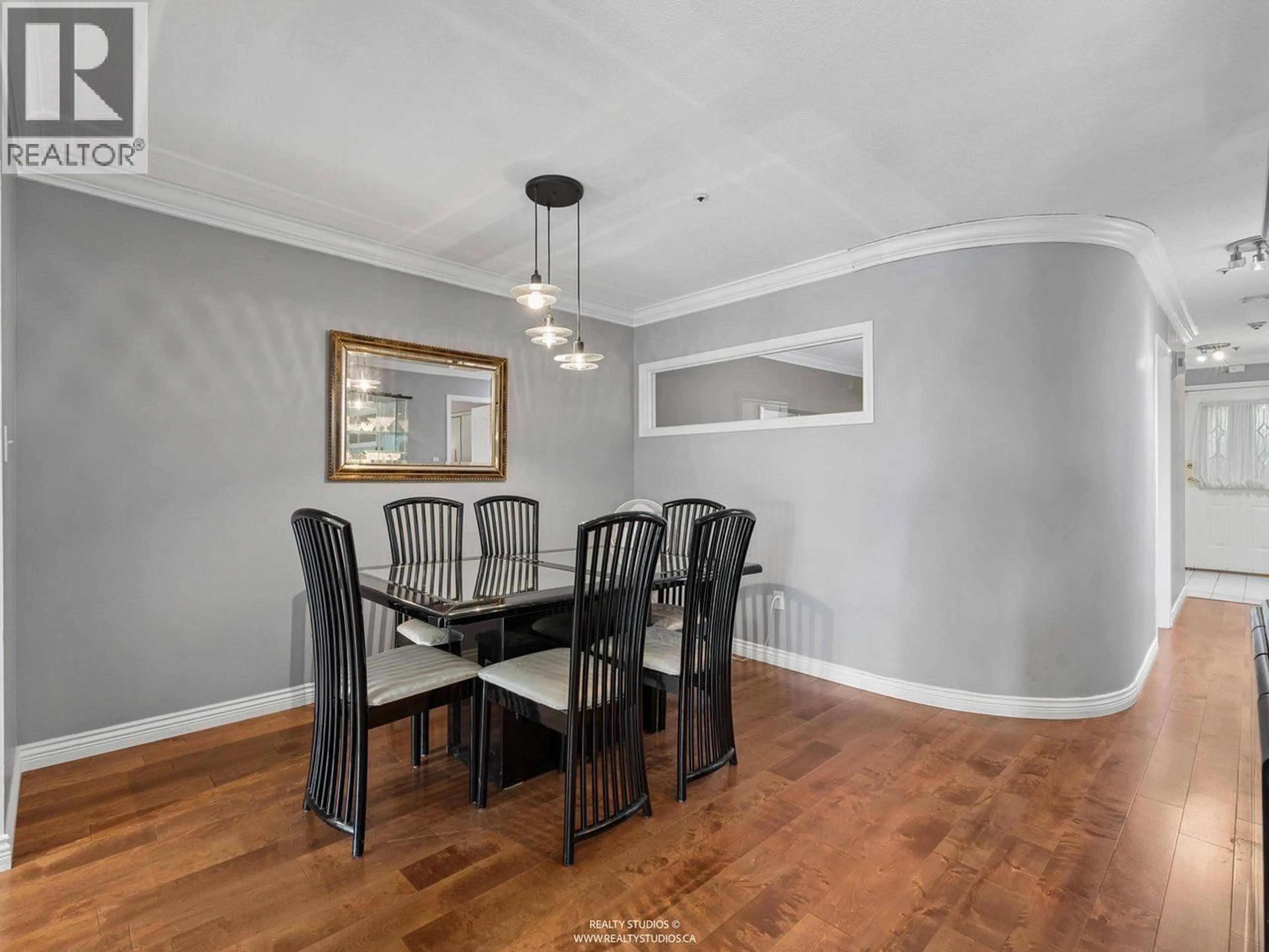 Dining room, wood/laminate floor for 111 - 2250 MARINE DRIVE, Vancouver British Columbia V5P2S2