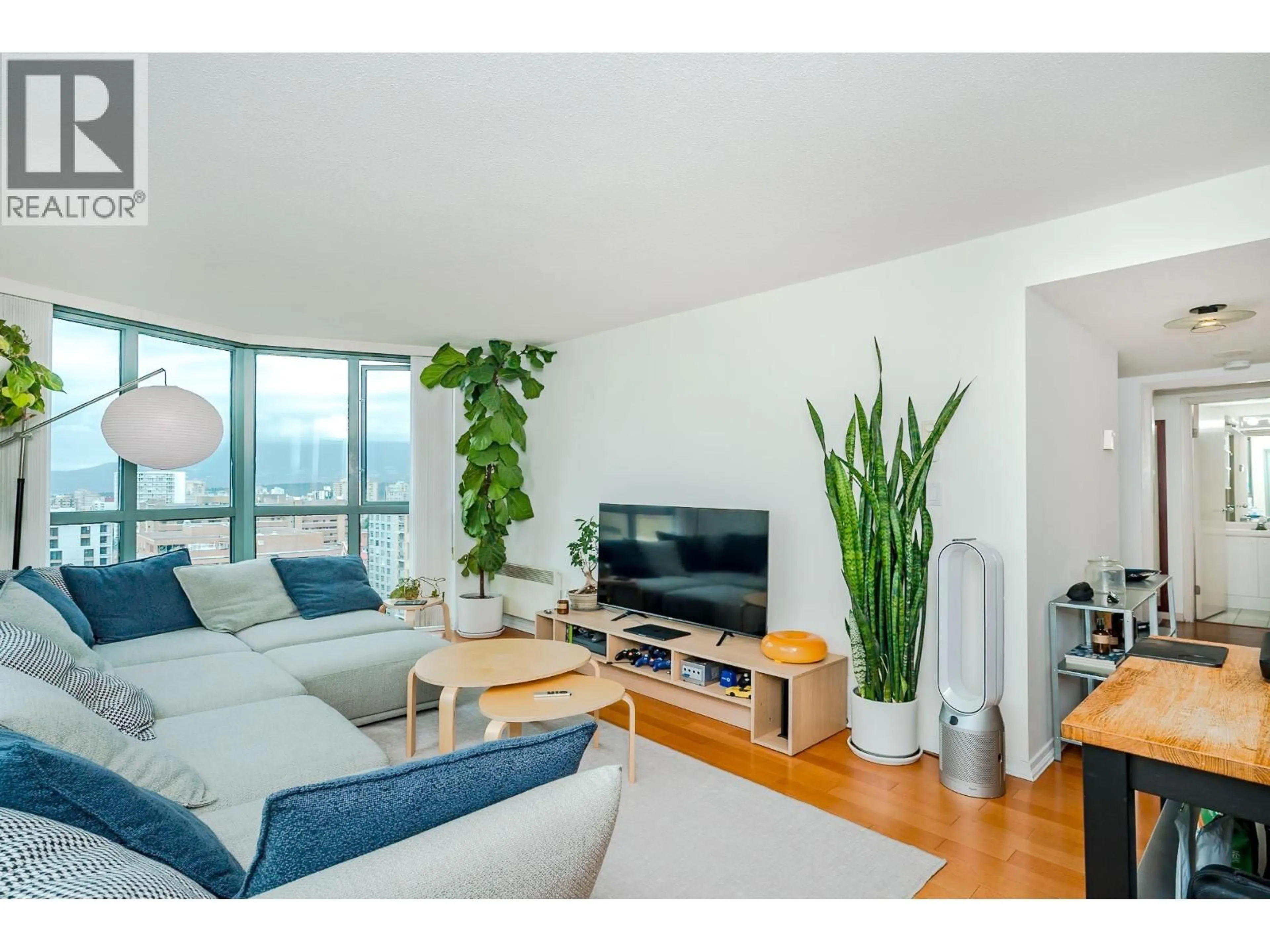 Living room with furniture, wood/laminate floor for 2601 - 1188 HOWE STREET, Vancouver British Columbia V6Z2S8