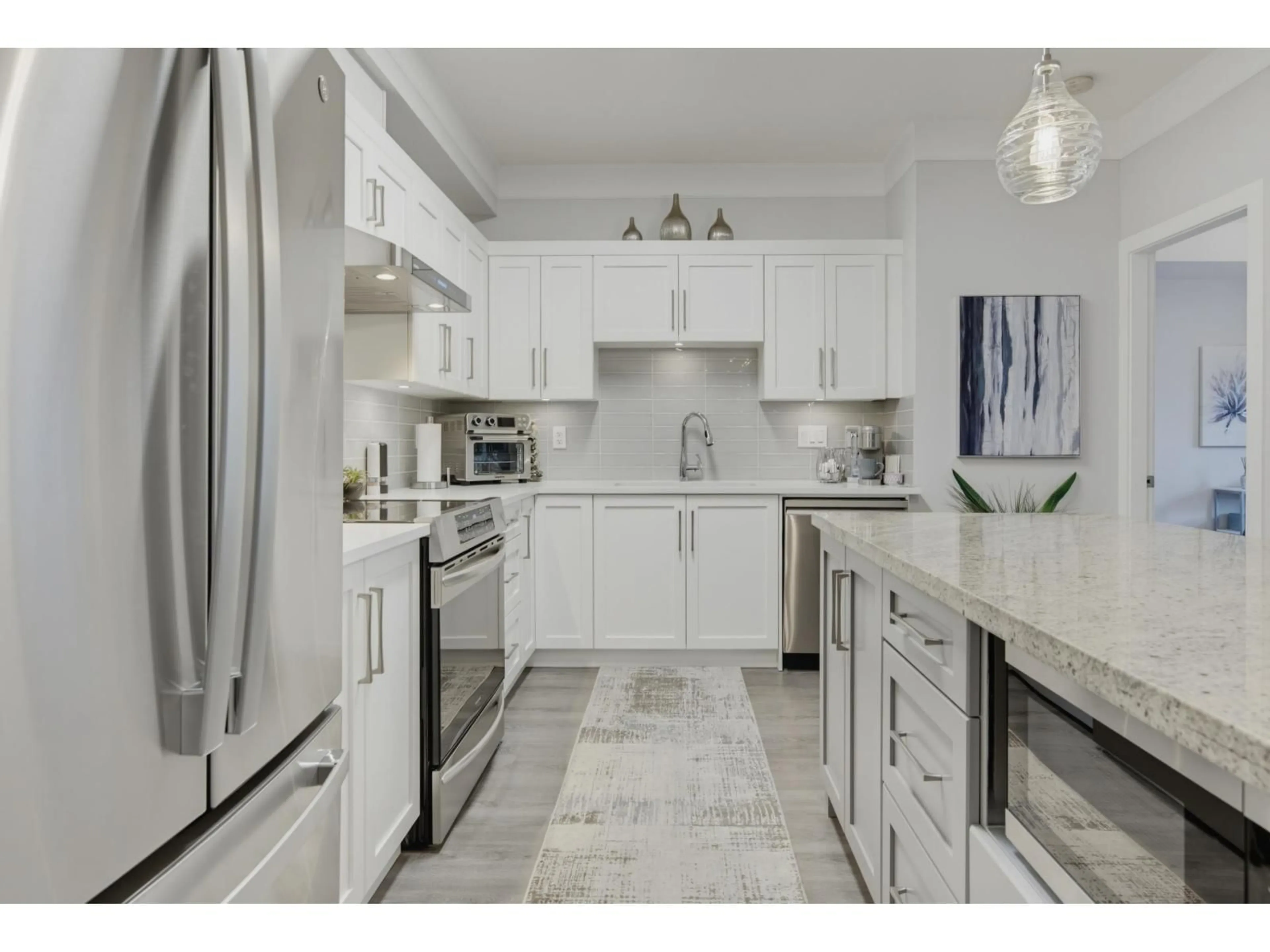 Open concept kitchen, ceramic/tile floor for 209 - 20630 DOUGLAS CRESCENT, Langley British Columbia V3A4B8