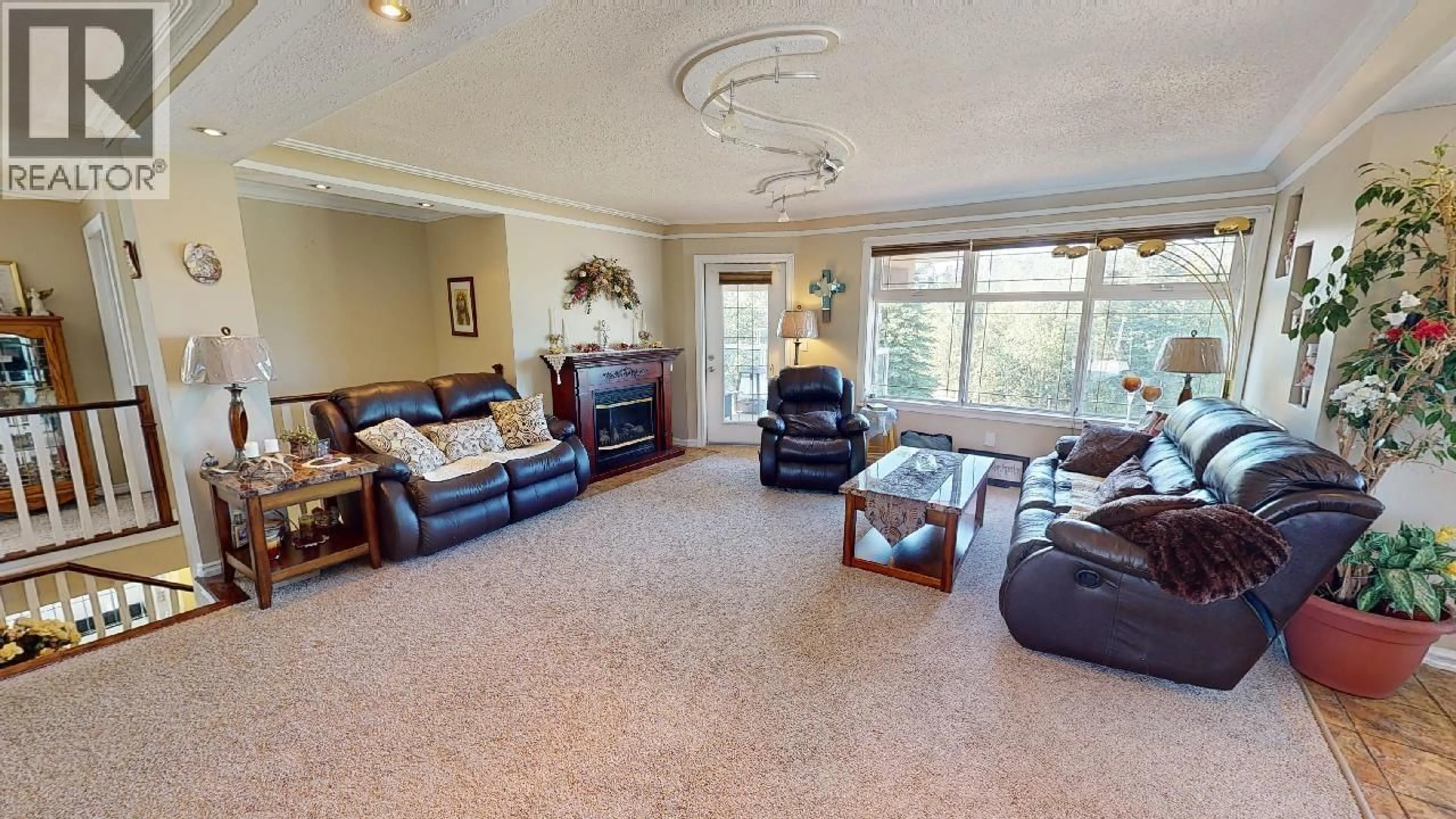 Living room with furniture, unknown for 14802 PINECONE ROAD, Fort St. John British Columbia V0C1H0