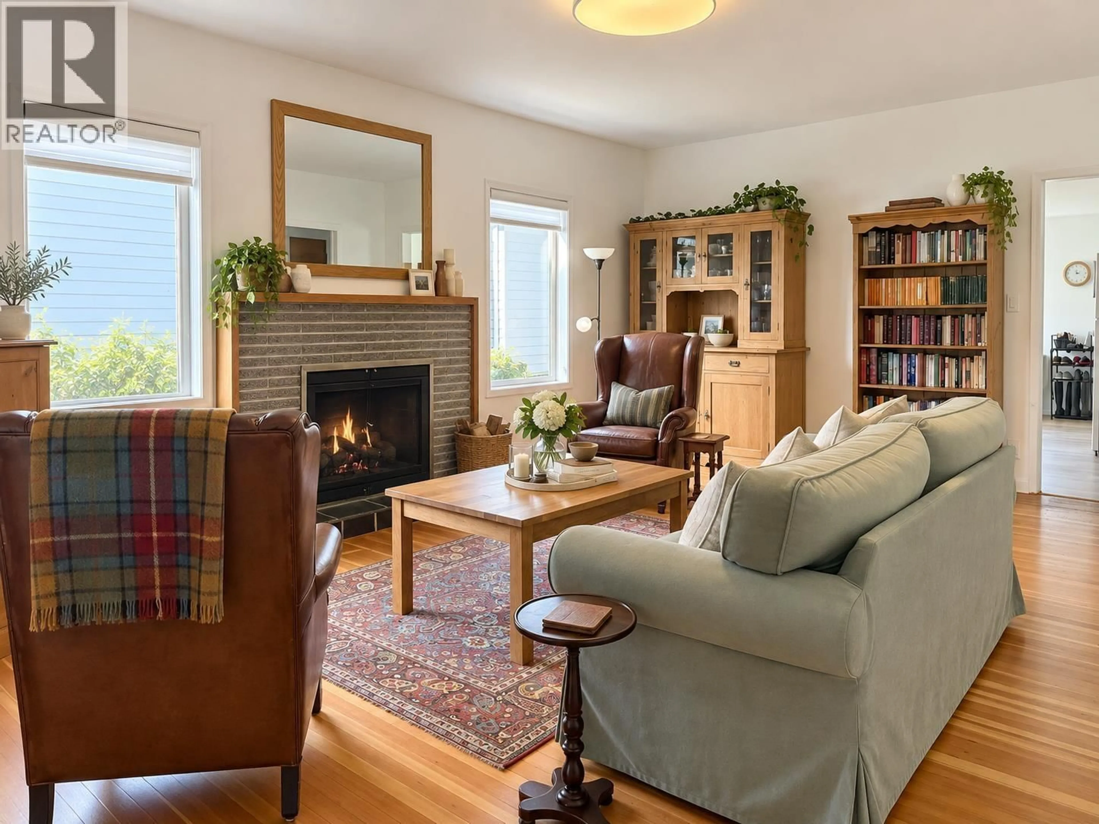 Living room with furniture, wood/laminate floor for 216 18TH STREET, North Vancouver British Columbia V7L2X6