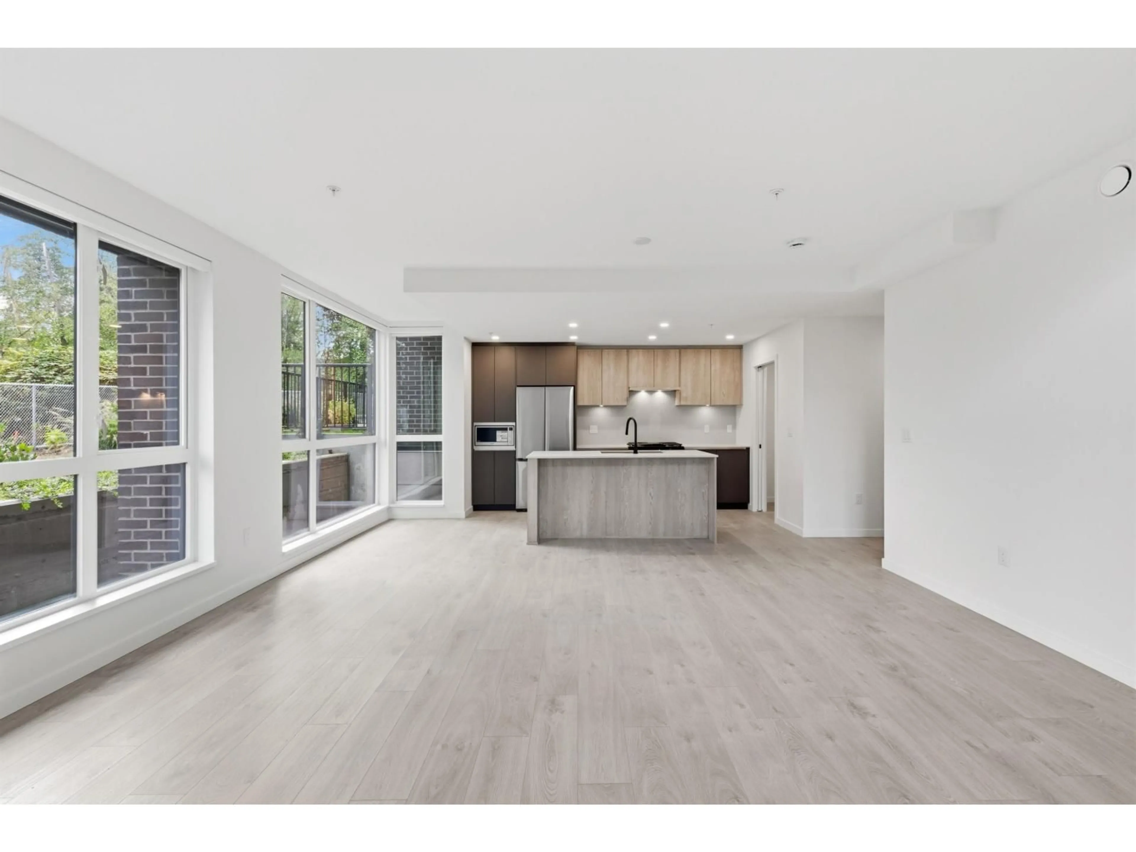 Open concept kitchen, unknown for 102 - 6585 195A STREET, Surrey British Columbia V4N6B5