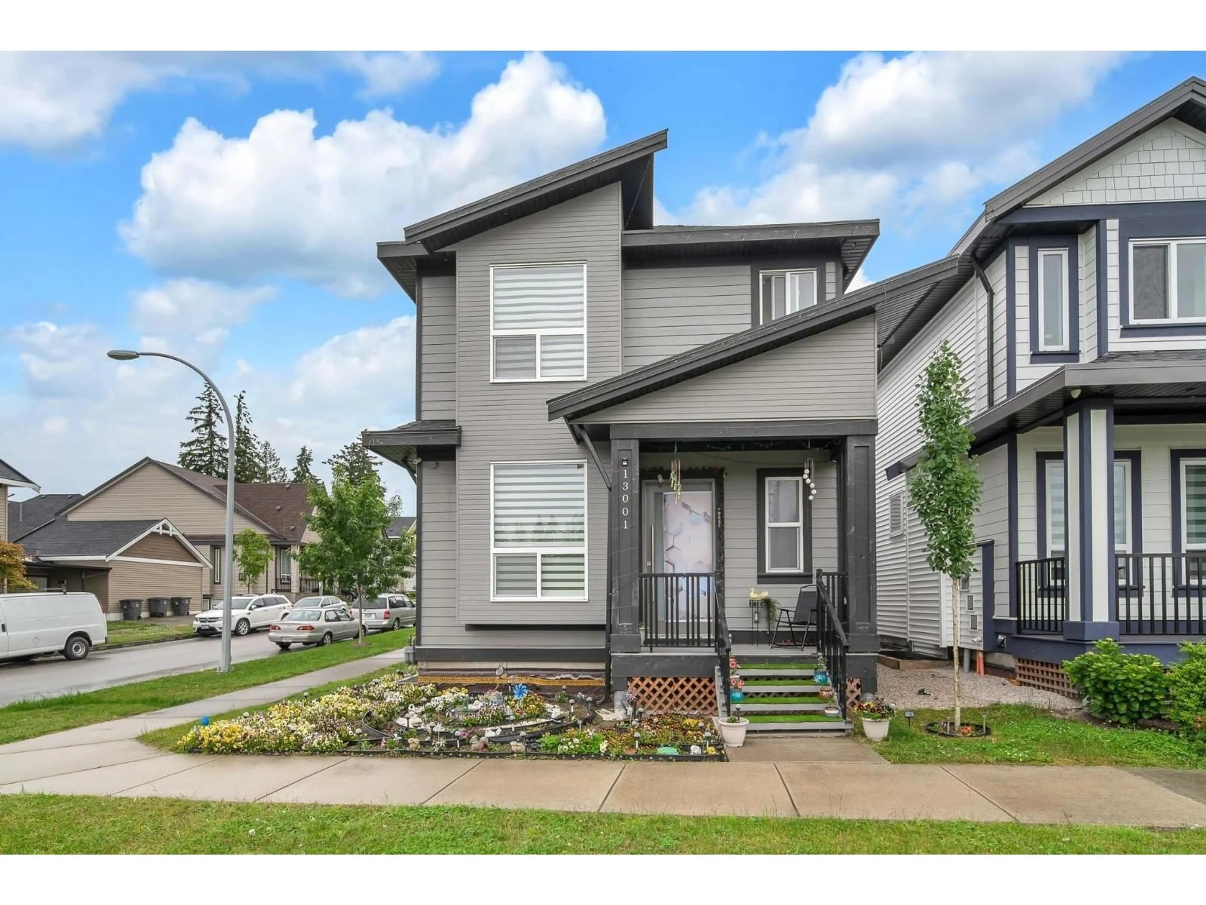 Home with vinyl exterior material, street for 13001 59 AVENUE, Surrey British Columbia V3X0G5