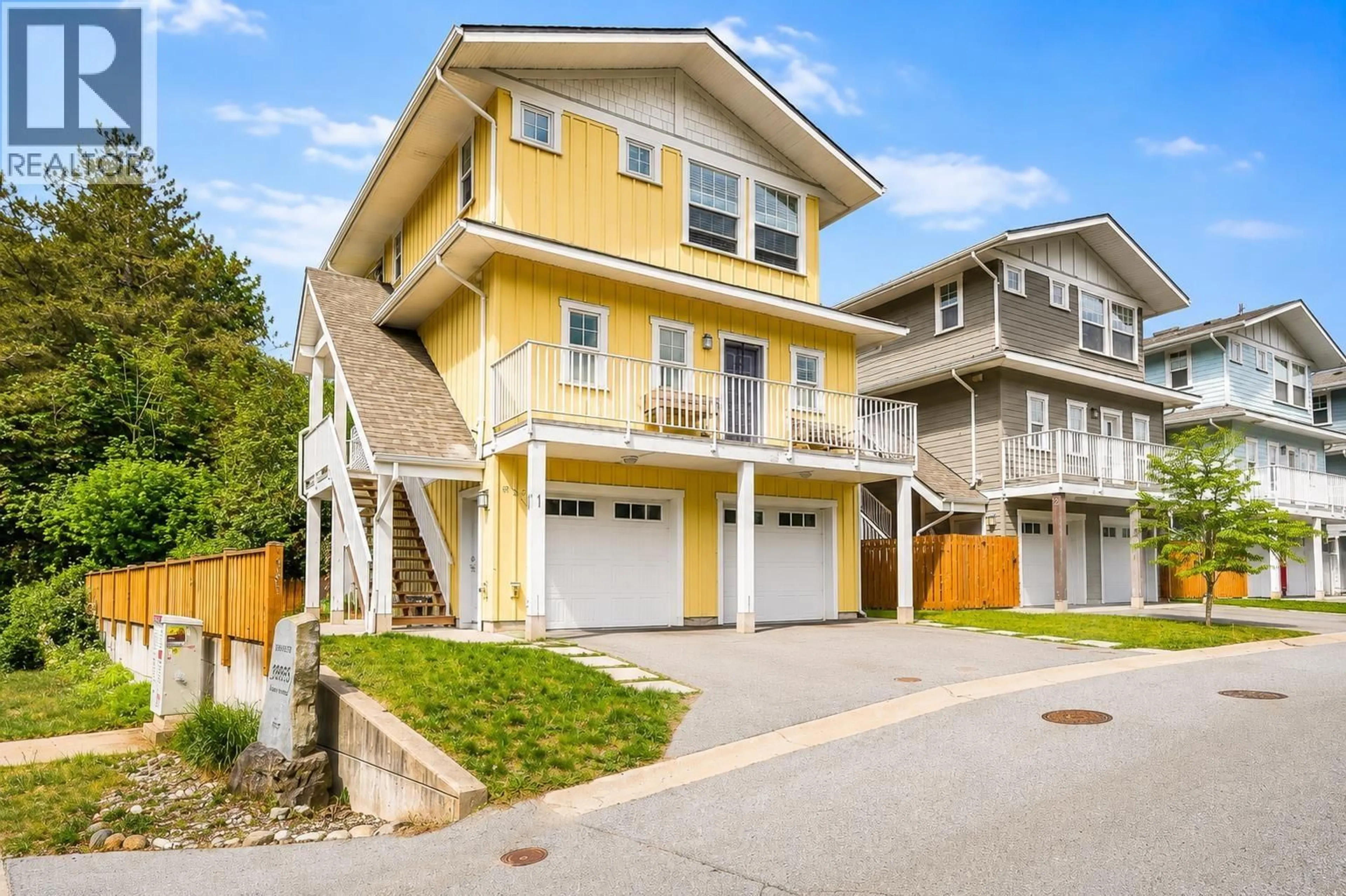 Home with vinyl exterior material, street for 1 - 39885 GOVERNMENT ROAD, Squamish British Columbia V8B0Z2