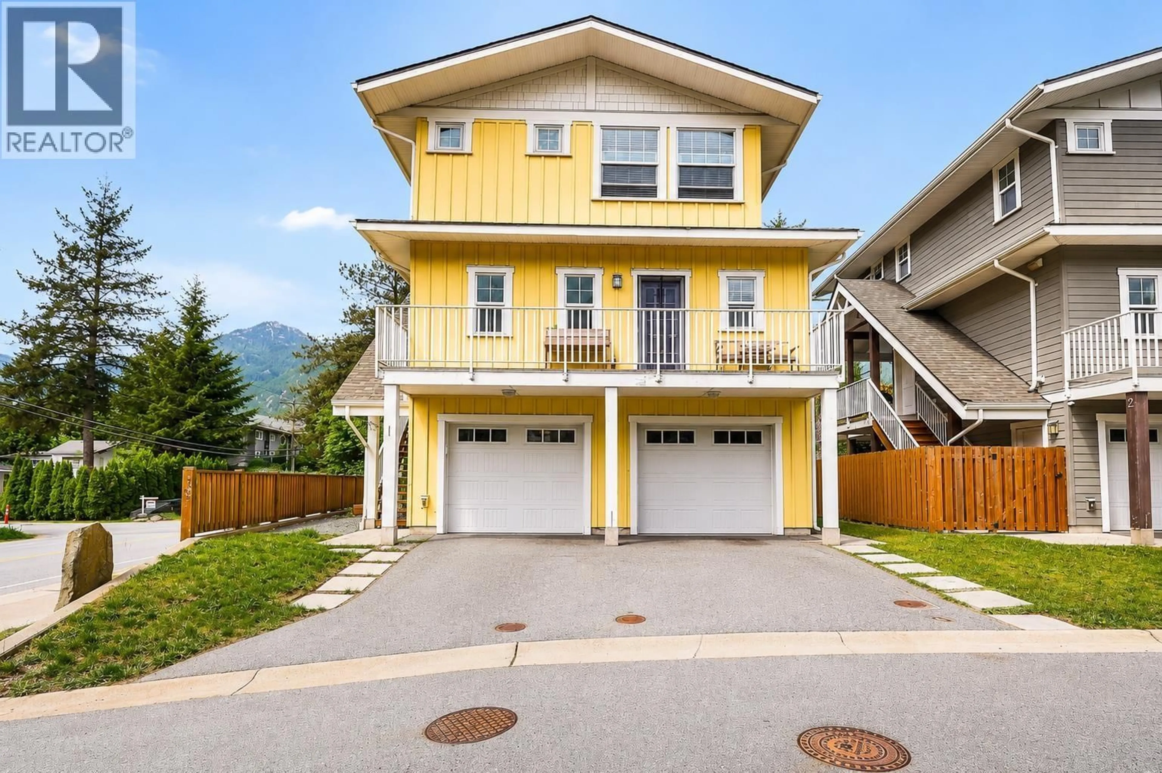Home with vinyl exterior material, street for 1 - 39885 GOVERNMENT ROAD, Squamish British Columbia V8B0Z2