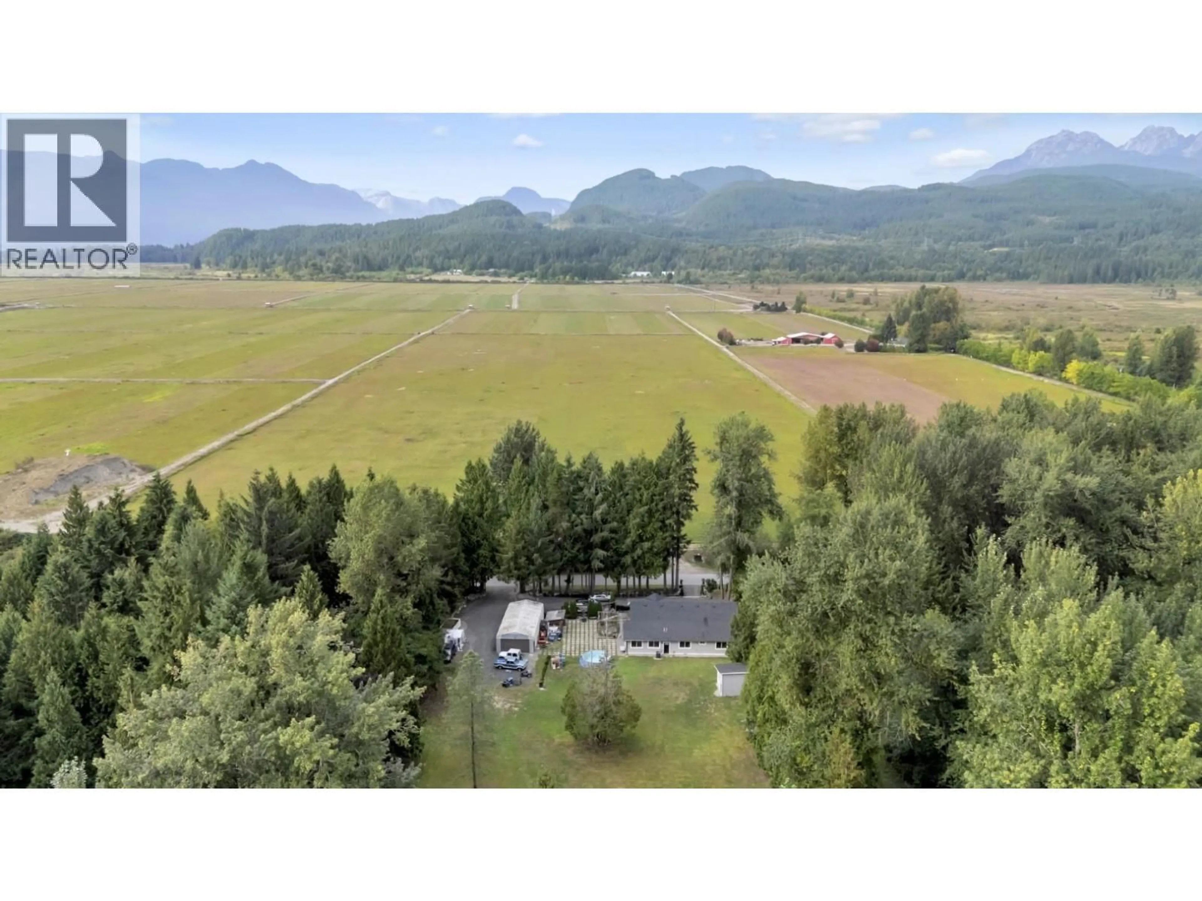 A pic from outside/outdoor area/front of a property/back of a property/a pic from drone, mountain view for 22288 136 AVENUE, Maple Ridge British Columbia V4R2P7