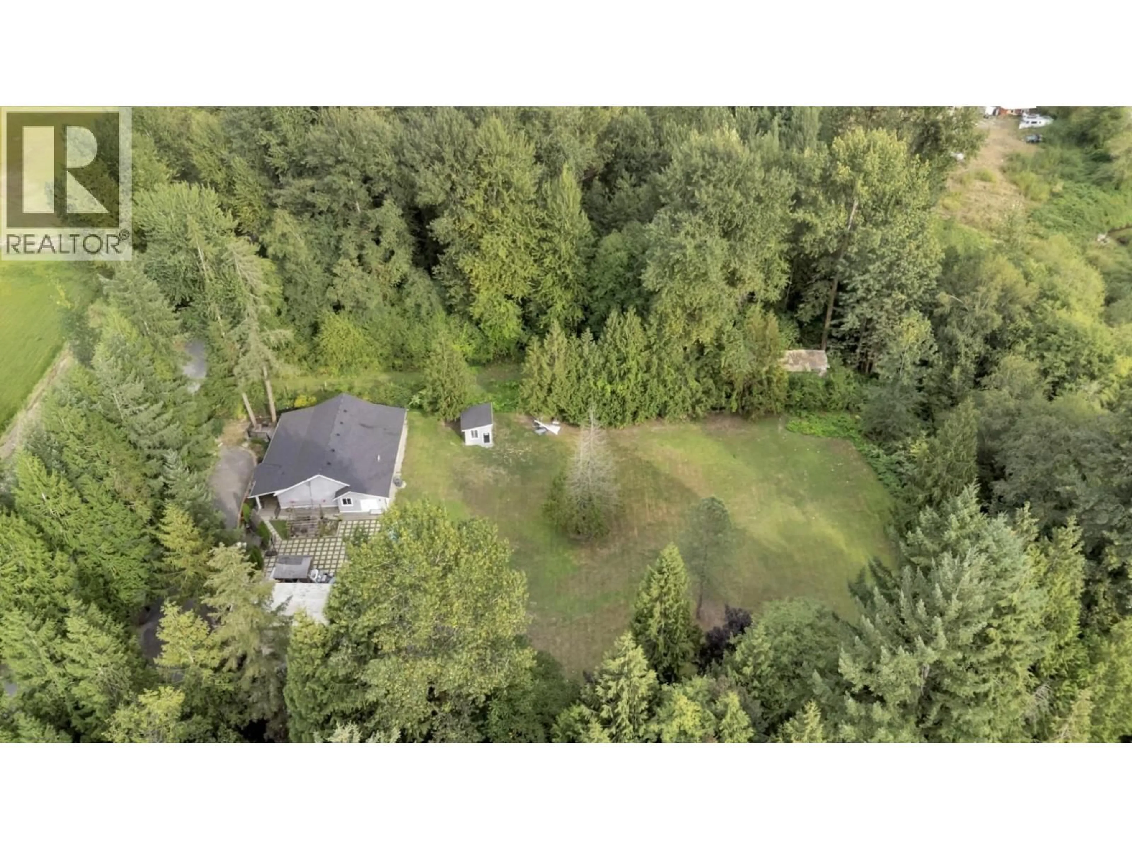 A pic from outside/outdoor area/front of a property/back of a property/a pic from drone, forest/trees view for 22288 136 AVENUE, Maple Ridge British Columbia V4R2P7