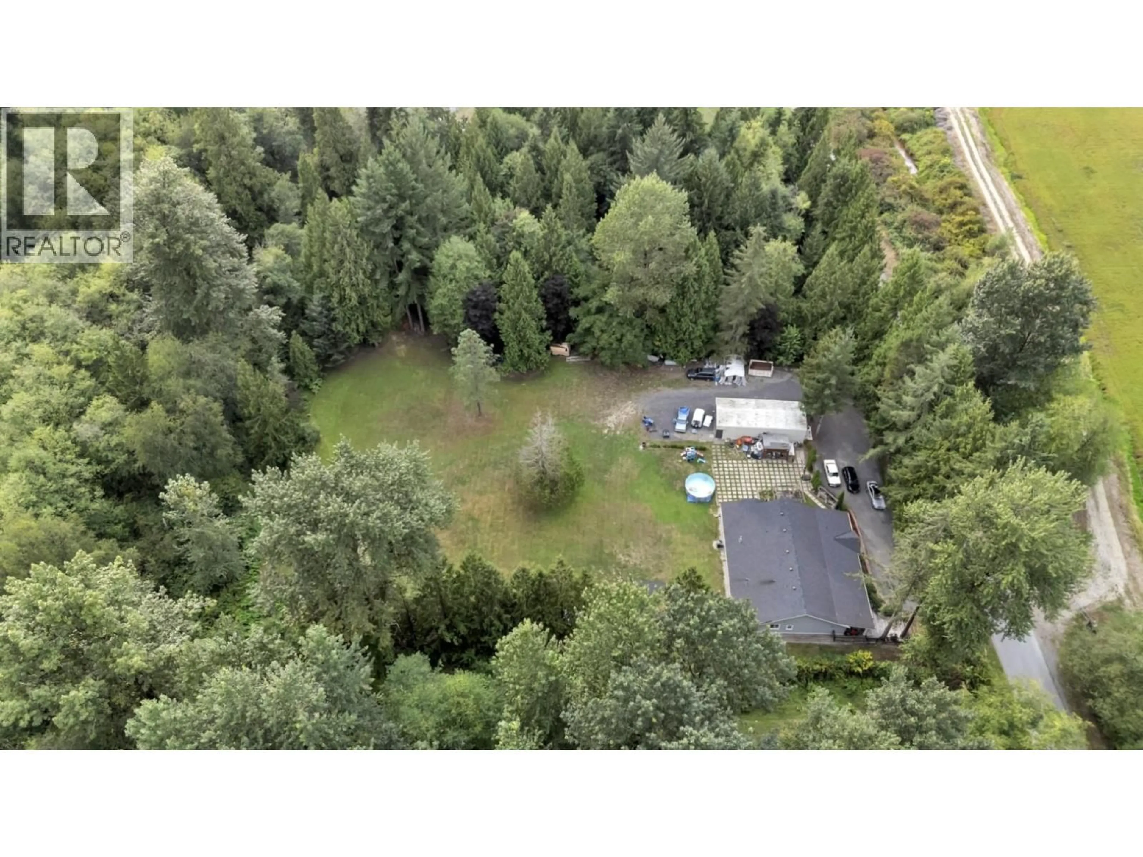 A pic from outside/outdoor area/front of a property/back of a property/a pic from drone, forest/trees view for 22288 136 AVENUE, Maple Ridge British Columbia V4R2P7