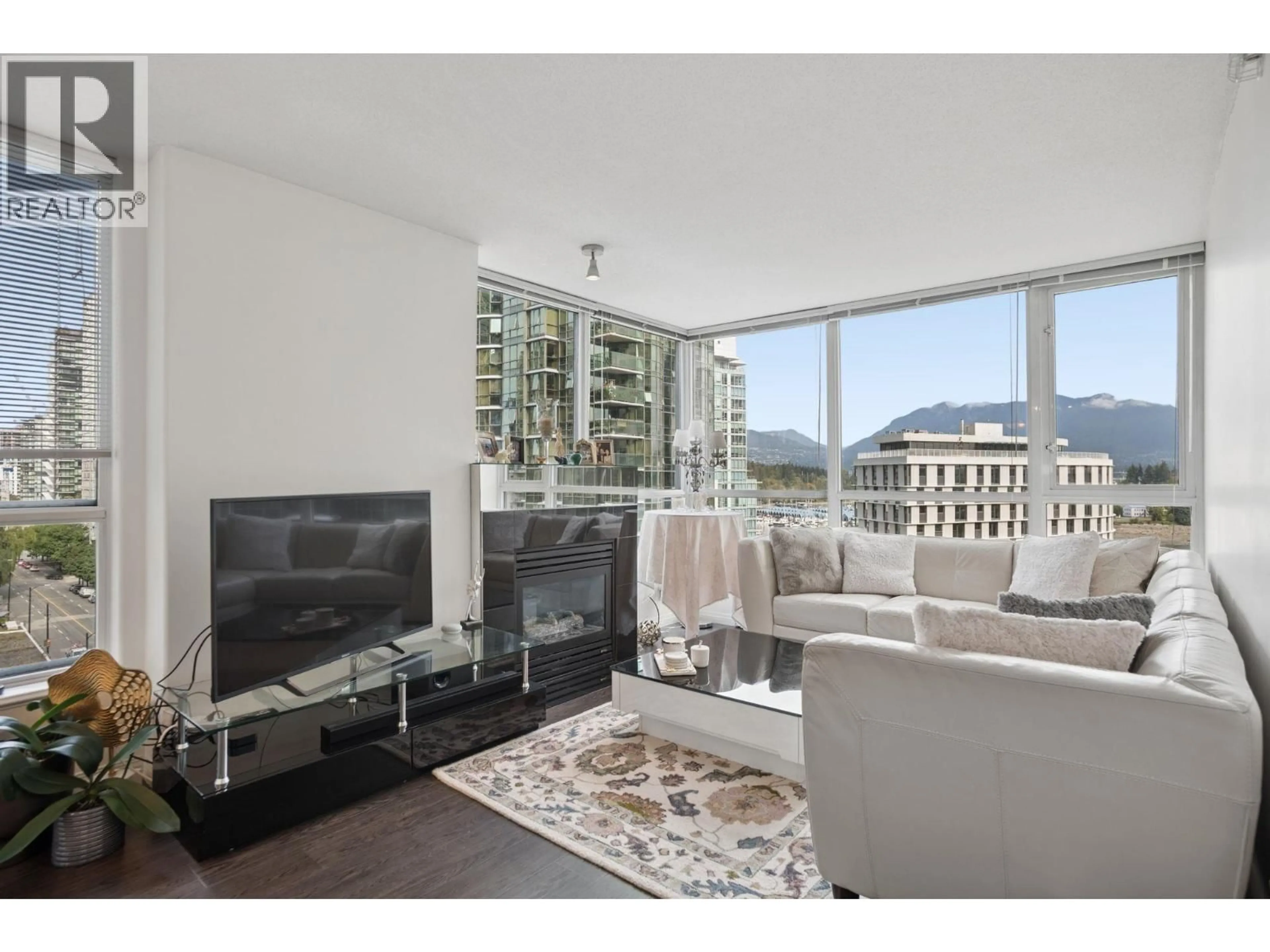 Living room with furniture, unknown for 1005 - 1328 PENDER STREET, Vancouver British Columbia V6E4T1