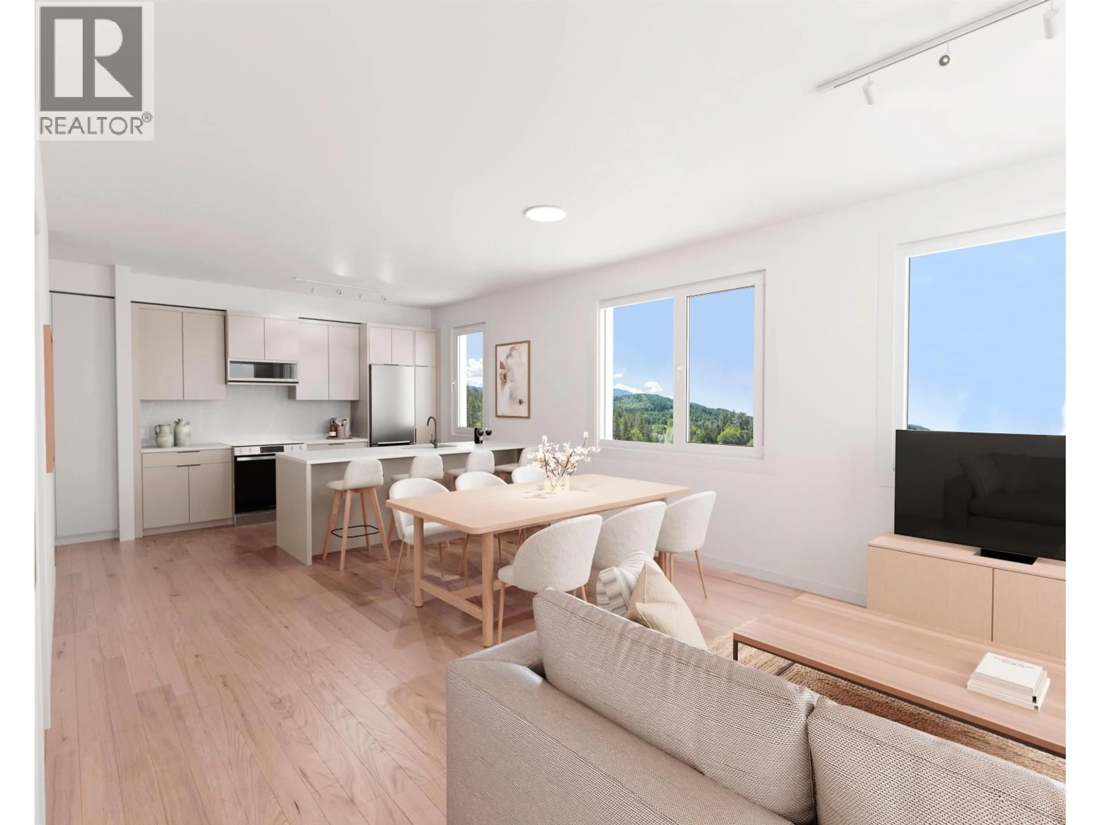 Open concept kitchen, wood/laminate floor for 209 - 1055 RAVEN DRIVE, Squamish British Columbia V0V0V0