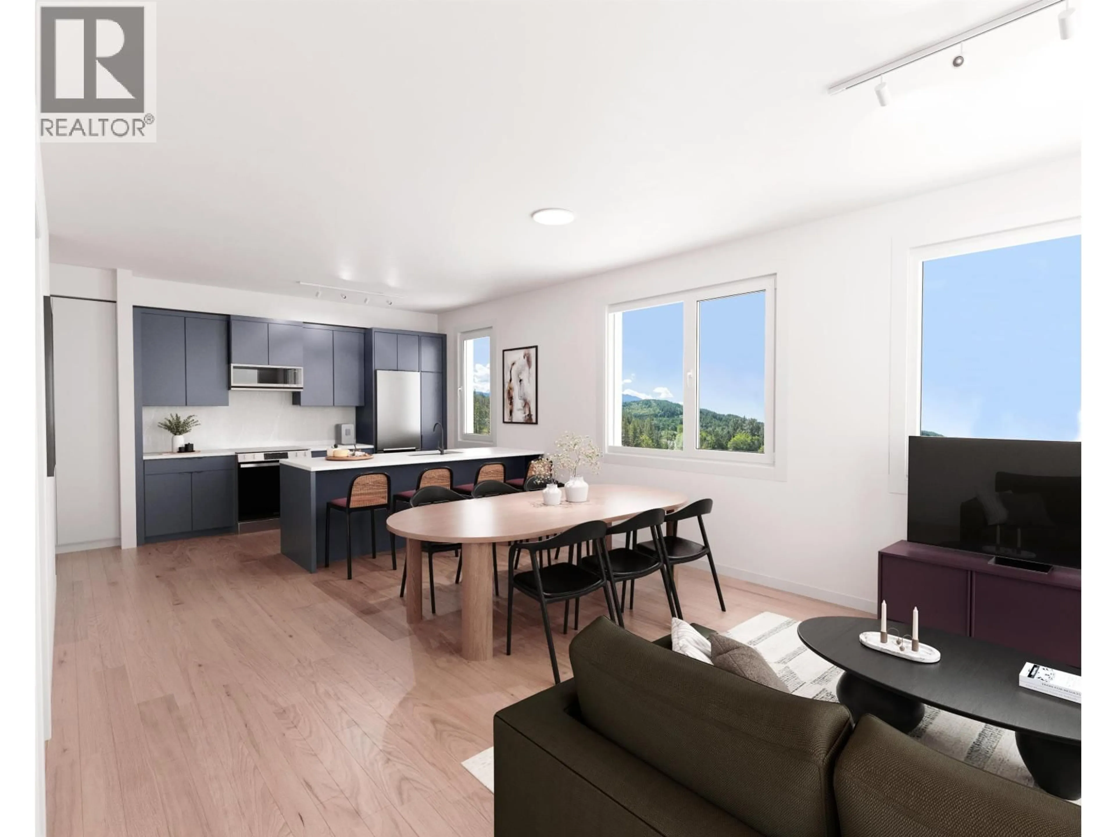 Open concept kitchen, wood/laminate floor for 209 - 1055 RAVEN DRIVE, Squamish British Columbia V0V0V0