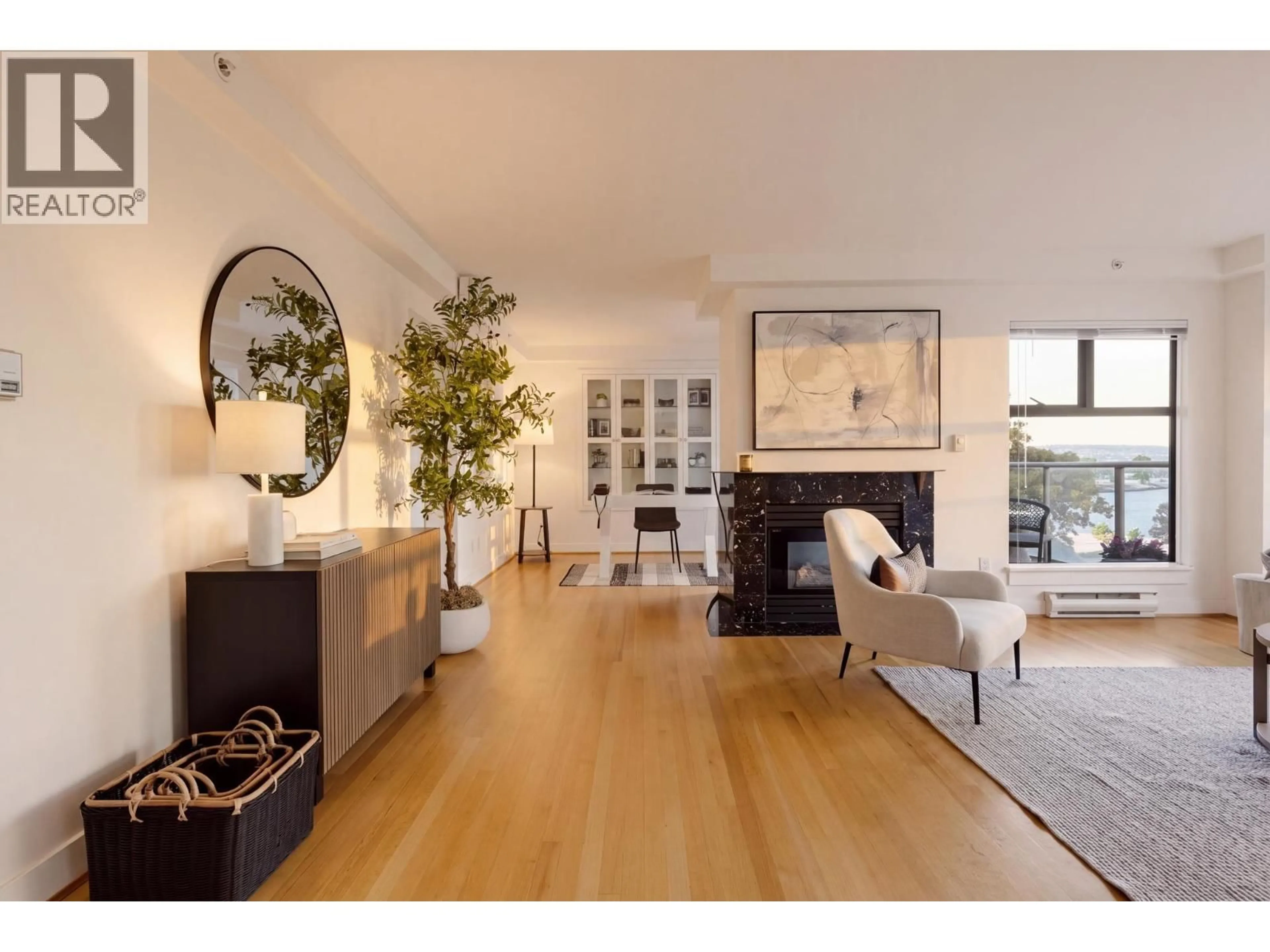 Living room with furniture, wood/laminate floor for 300 - 1410 BUTE STREET, Vancouver British Columbia V6E2A7