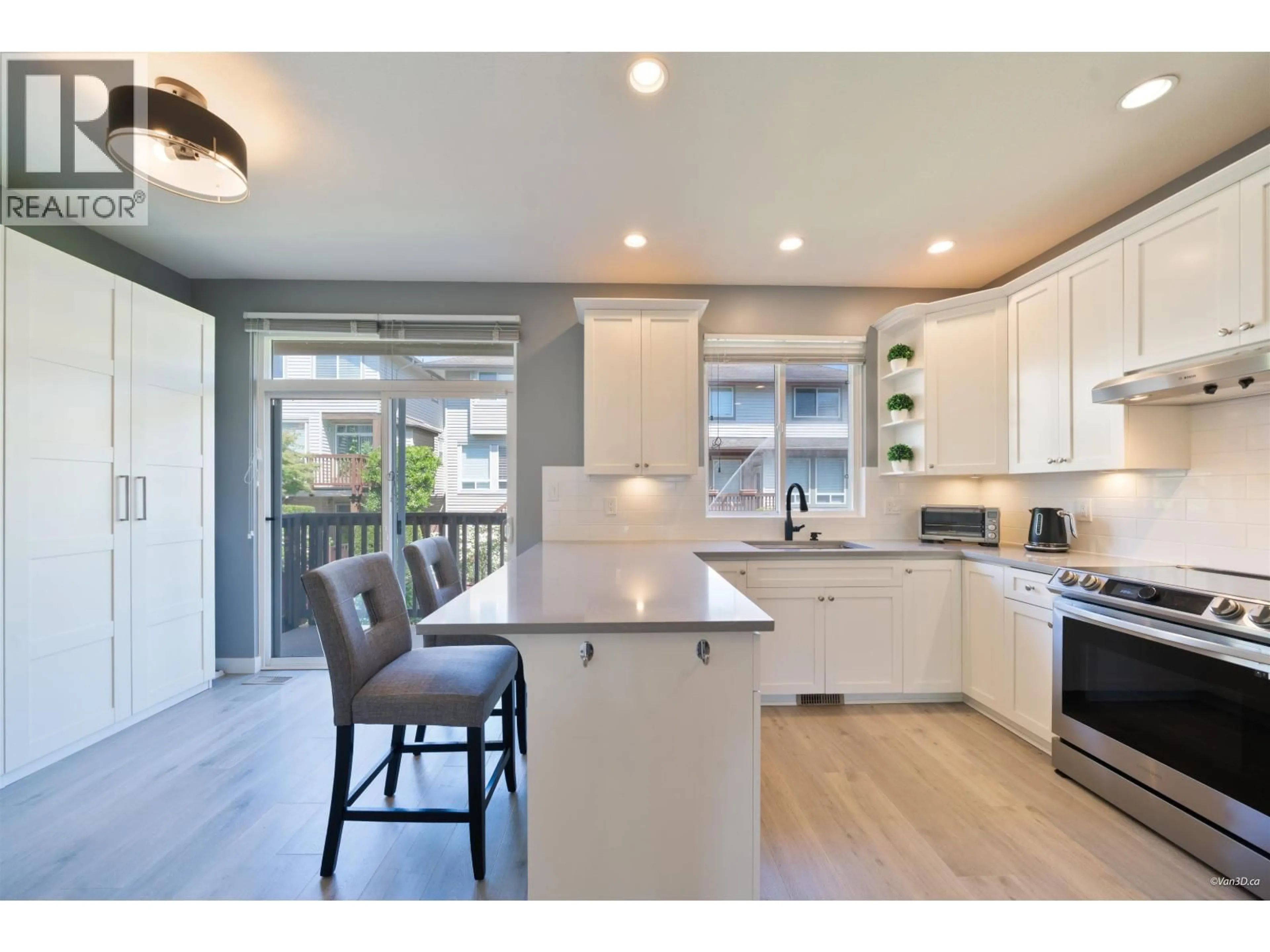 Open concept kitchen, wood/laminate floor for 23 - 2387 ARGUE STREET, Port Coquitlam British Columbia V3C6P5