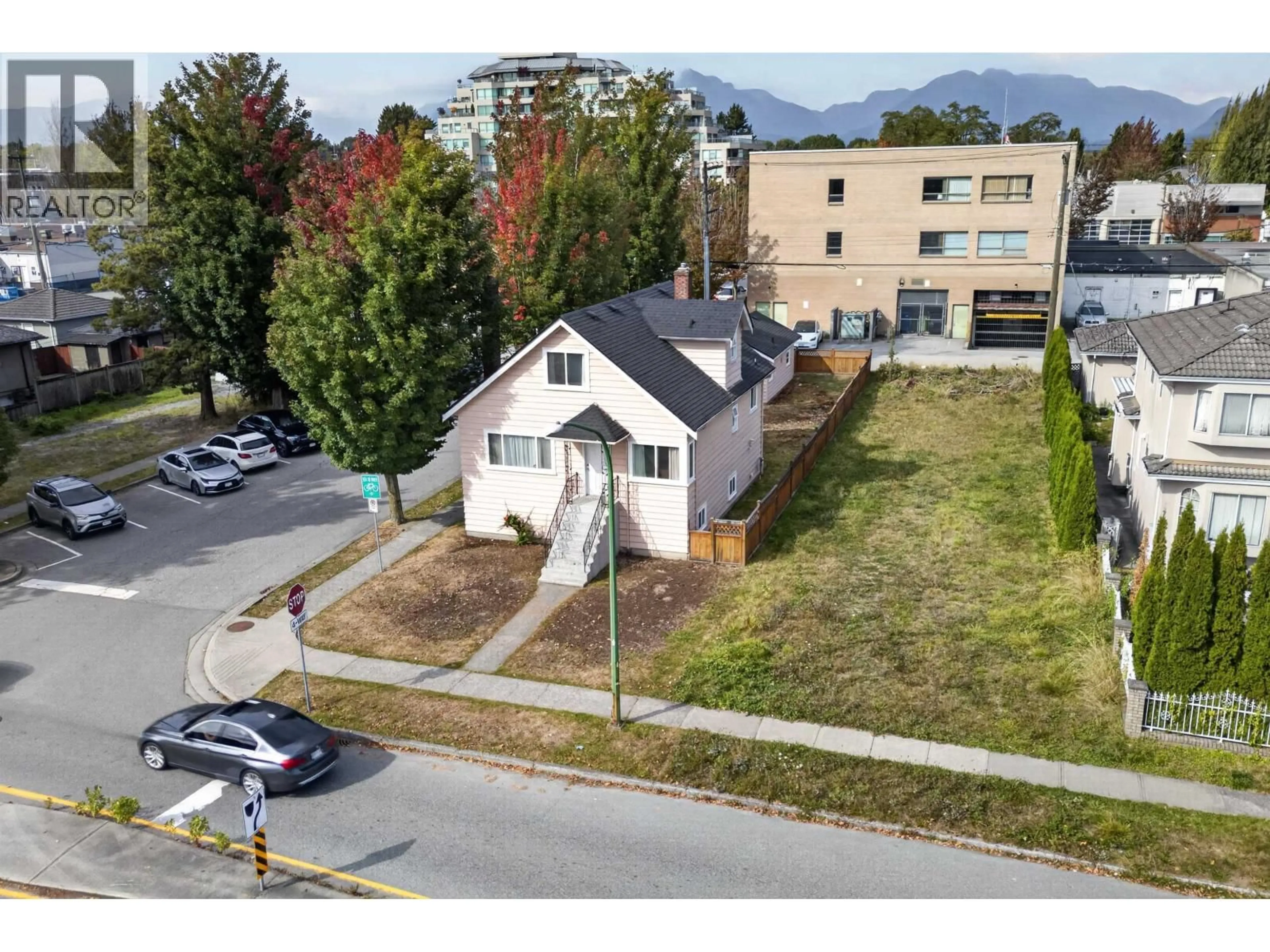 A pic from outside/outdoor area/front of a property/back of a property/a pic from drone, mountain view for 4205 PENDER STREET, Burnaby British Columbia V5C2M4