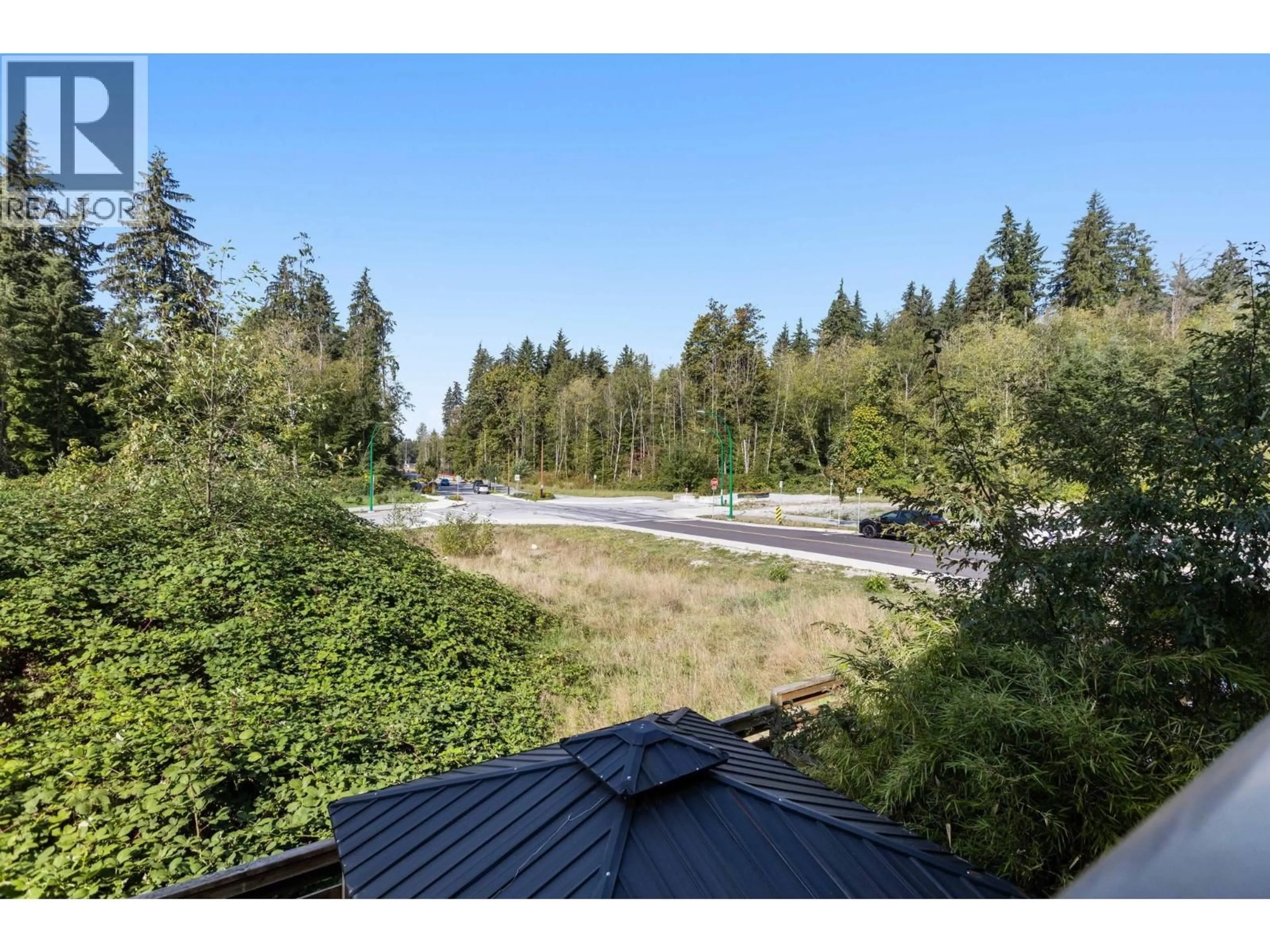A pic from outside/outdoor area/front of a property/back of a property/a pic from drone, forest/trees view for 53 - 3597 MALSUM DRIVE, North Vancouver British Columbia V7G0B2