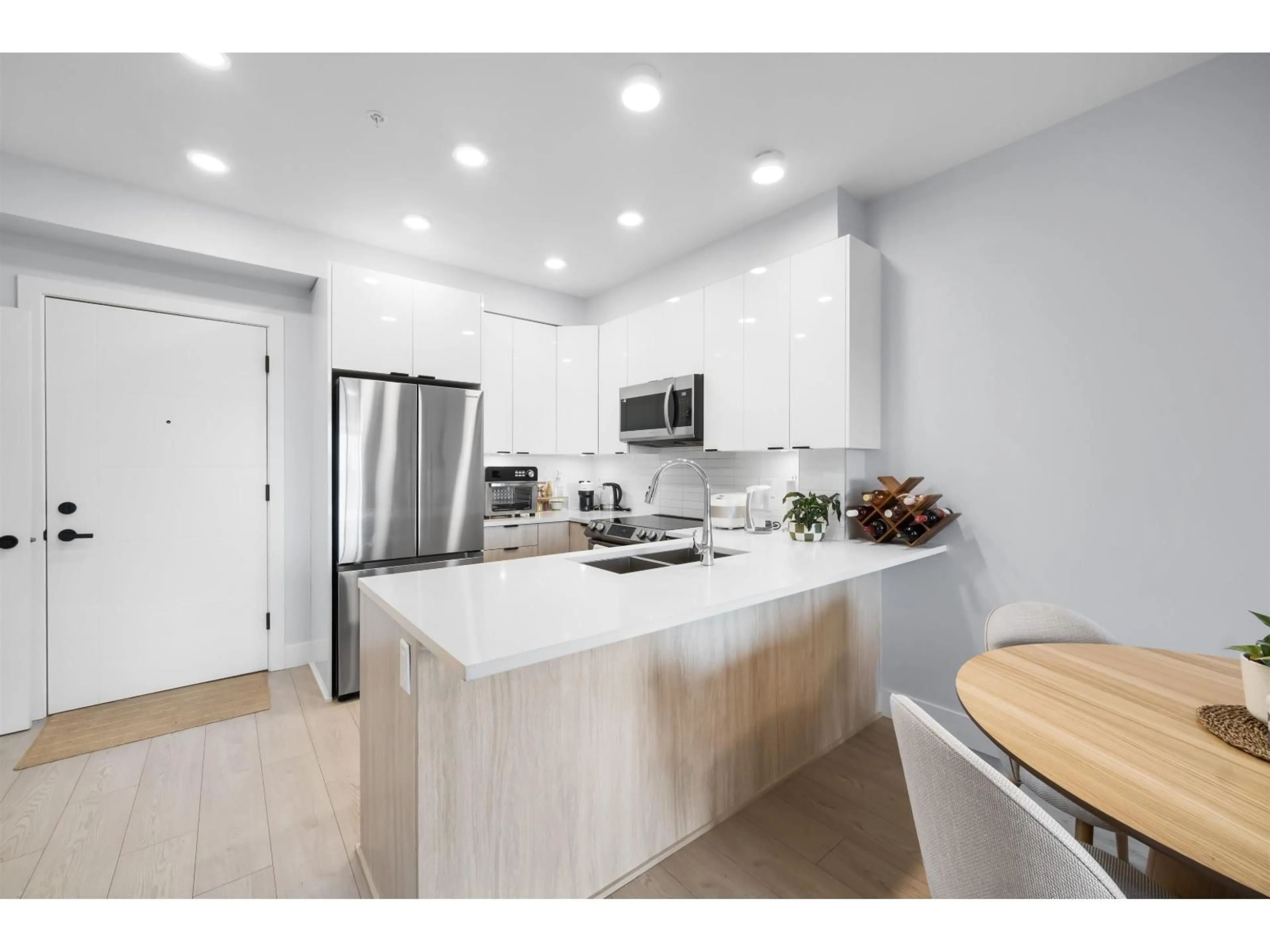 Open concept kitchen, unknown for 328 - 20360 LOGAN AVENUE, Langley British Columbia V3A0P5