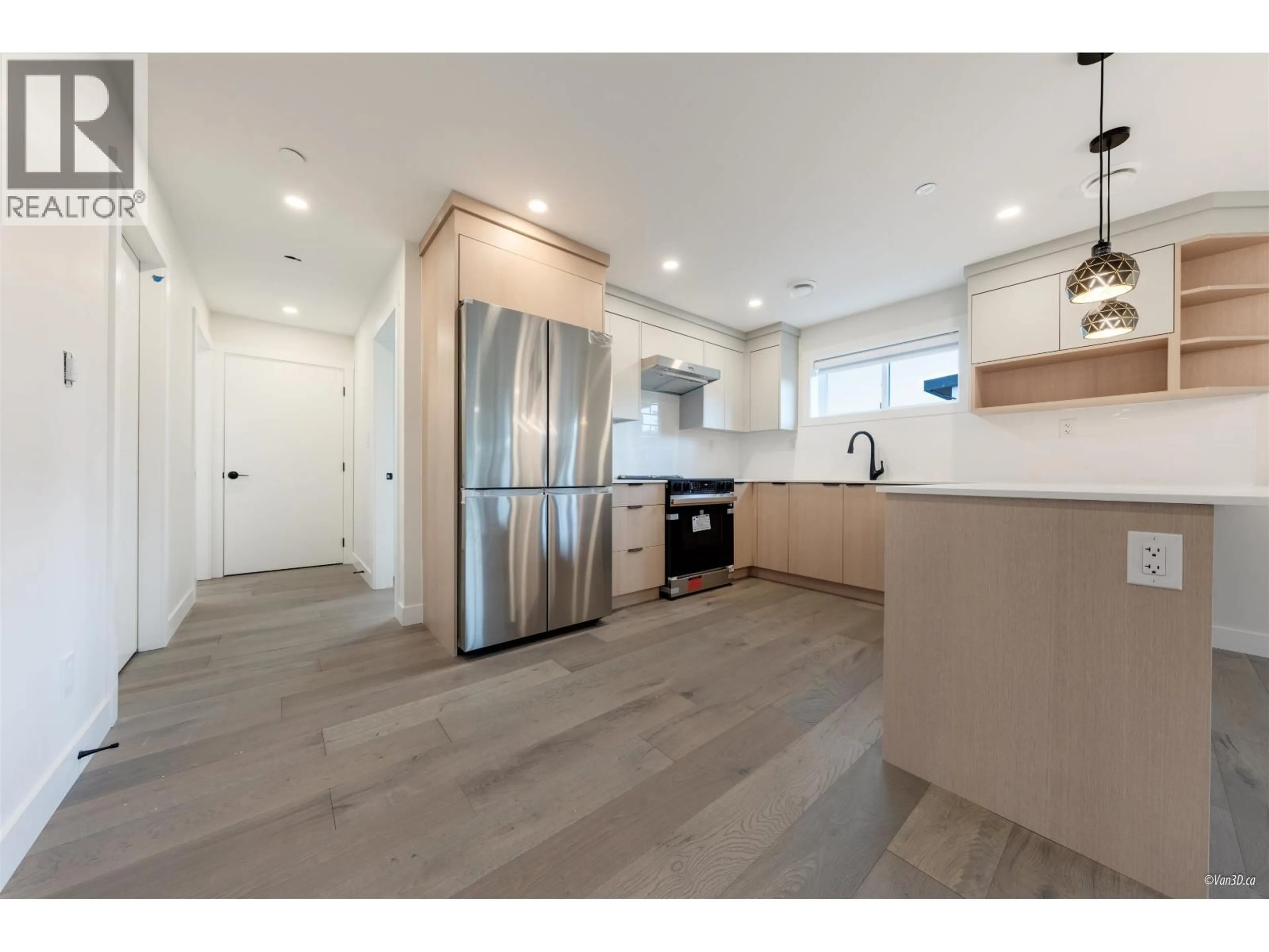 Open concept kitchen, unknown for 202 - 5092 SLOCAN STREET, Vancouver British Columbia V5R2A5